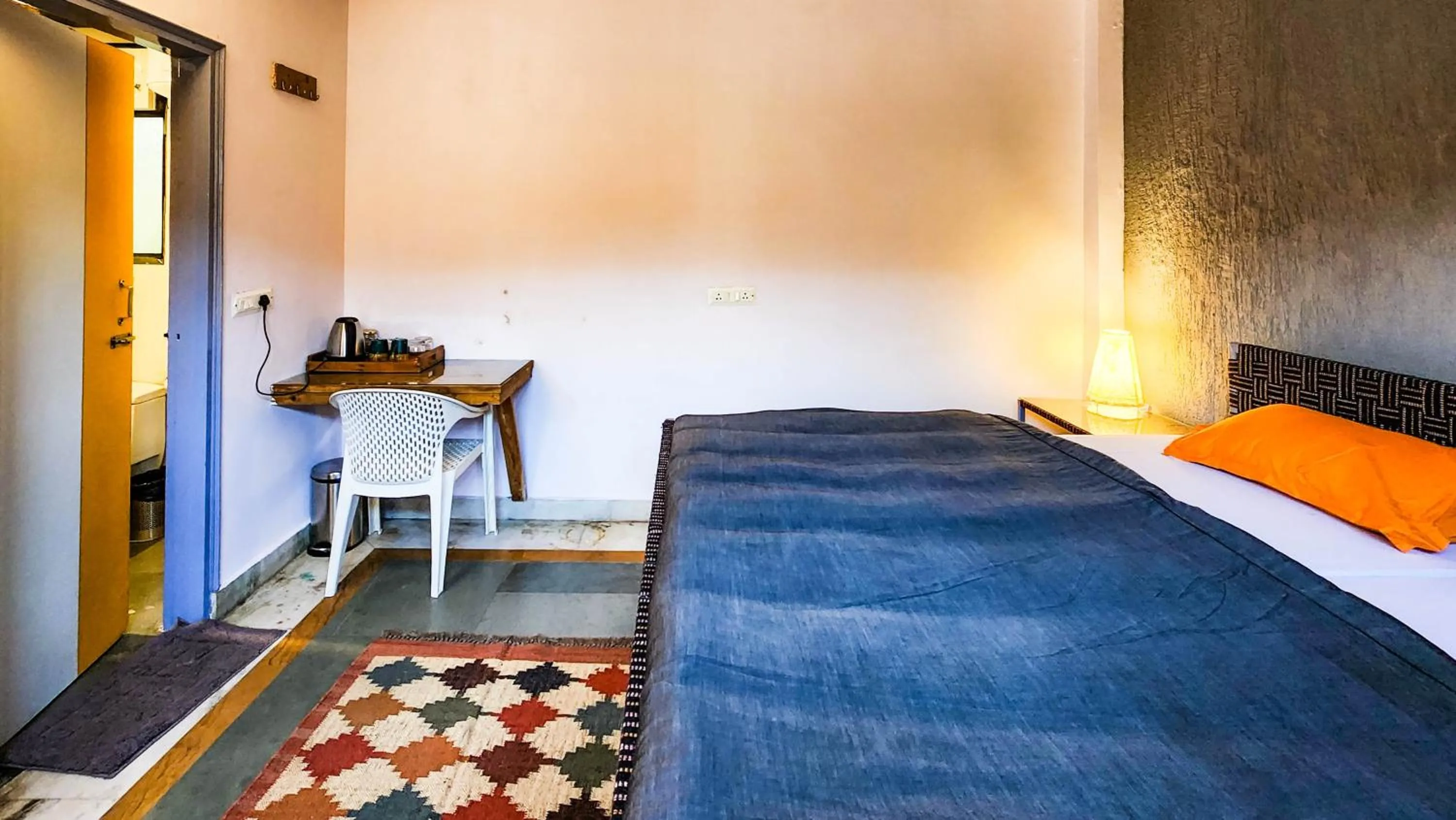 Bed in JHouse near Bhikaji