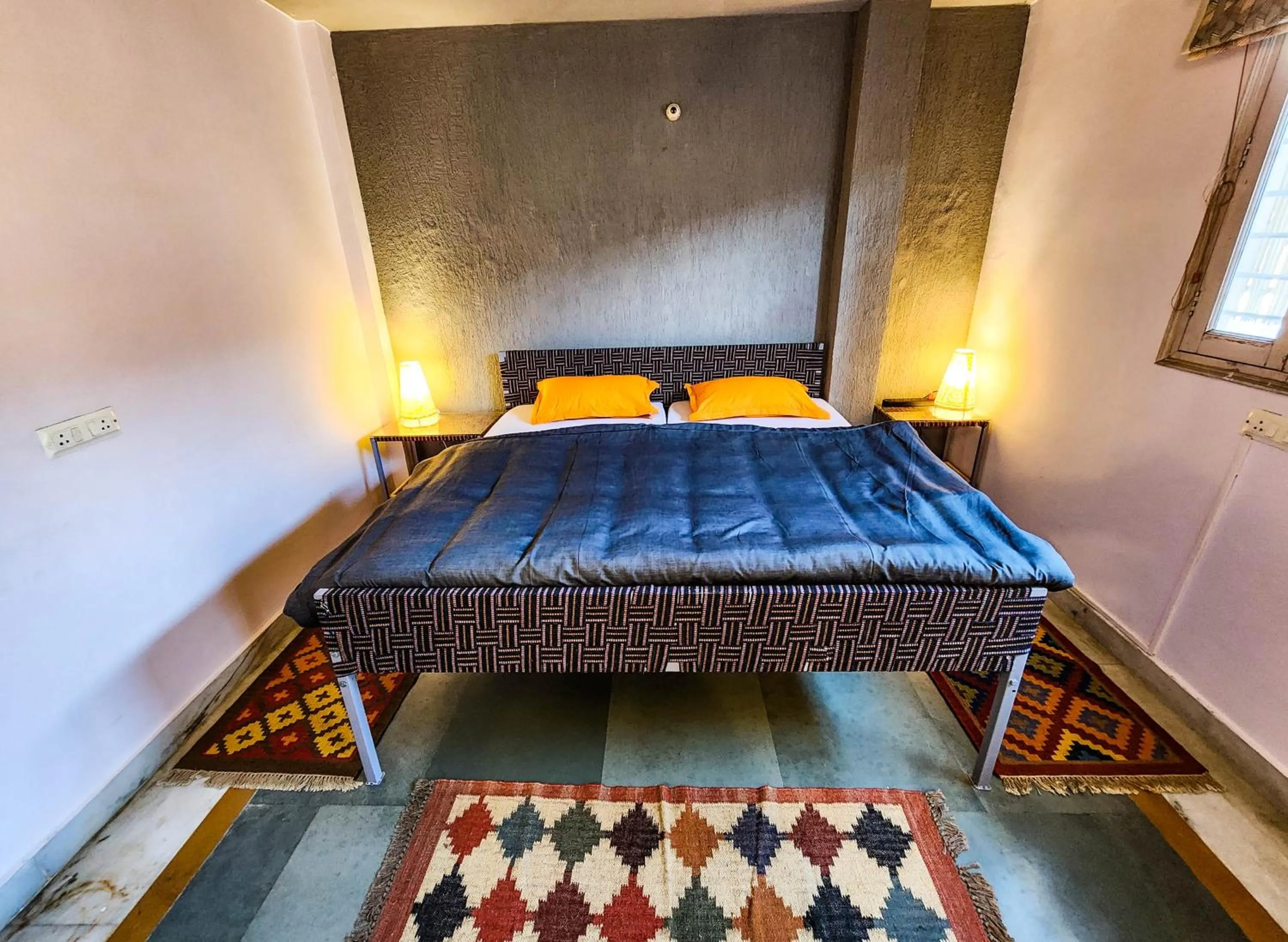 Bed in JHouse near Bhikaji