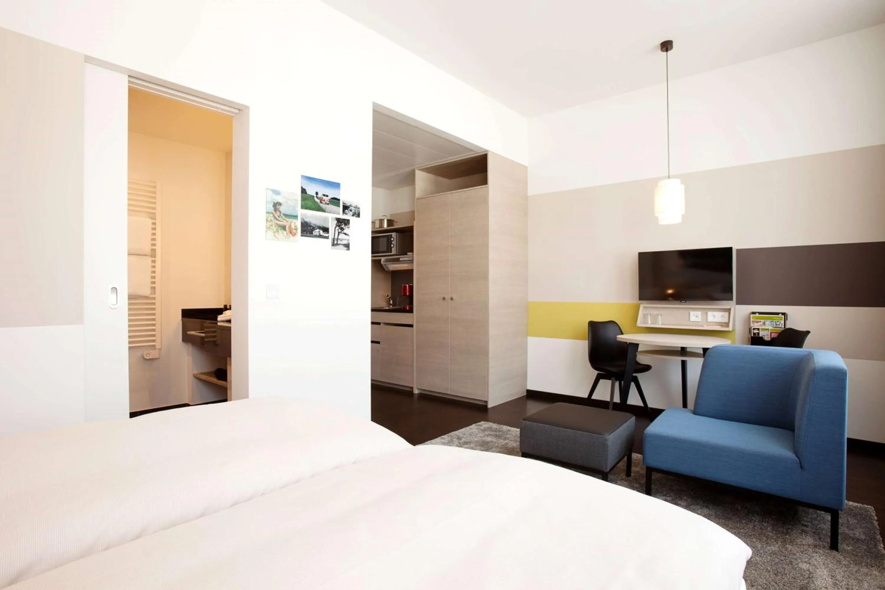 Bed in Vienna House Easy by Wyndham Osnabrück City & Apartments