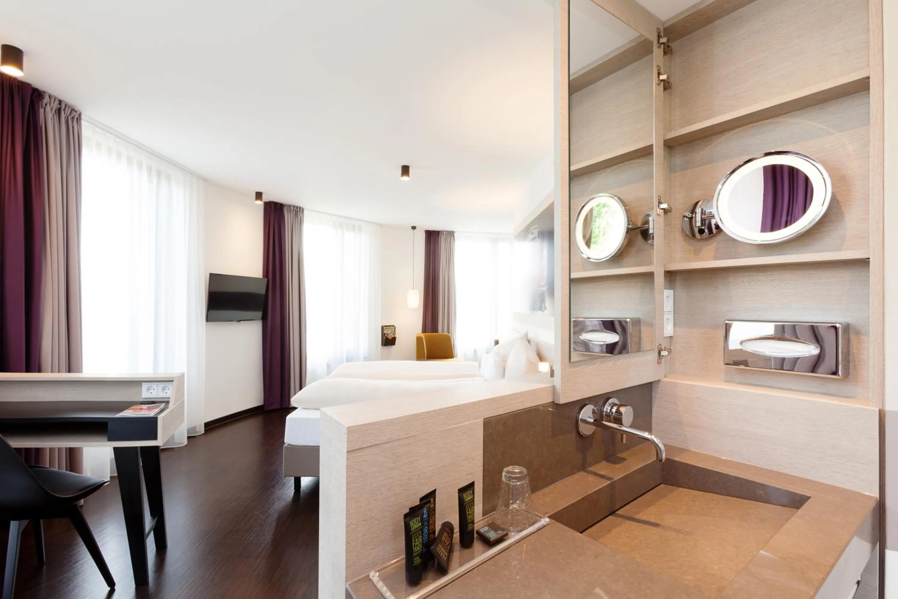 Bed in Vienna House Easy by Wyndham Osnabrück City & Apartments