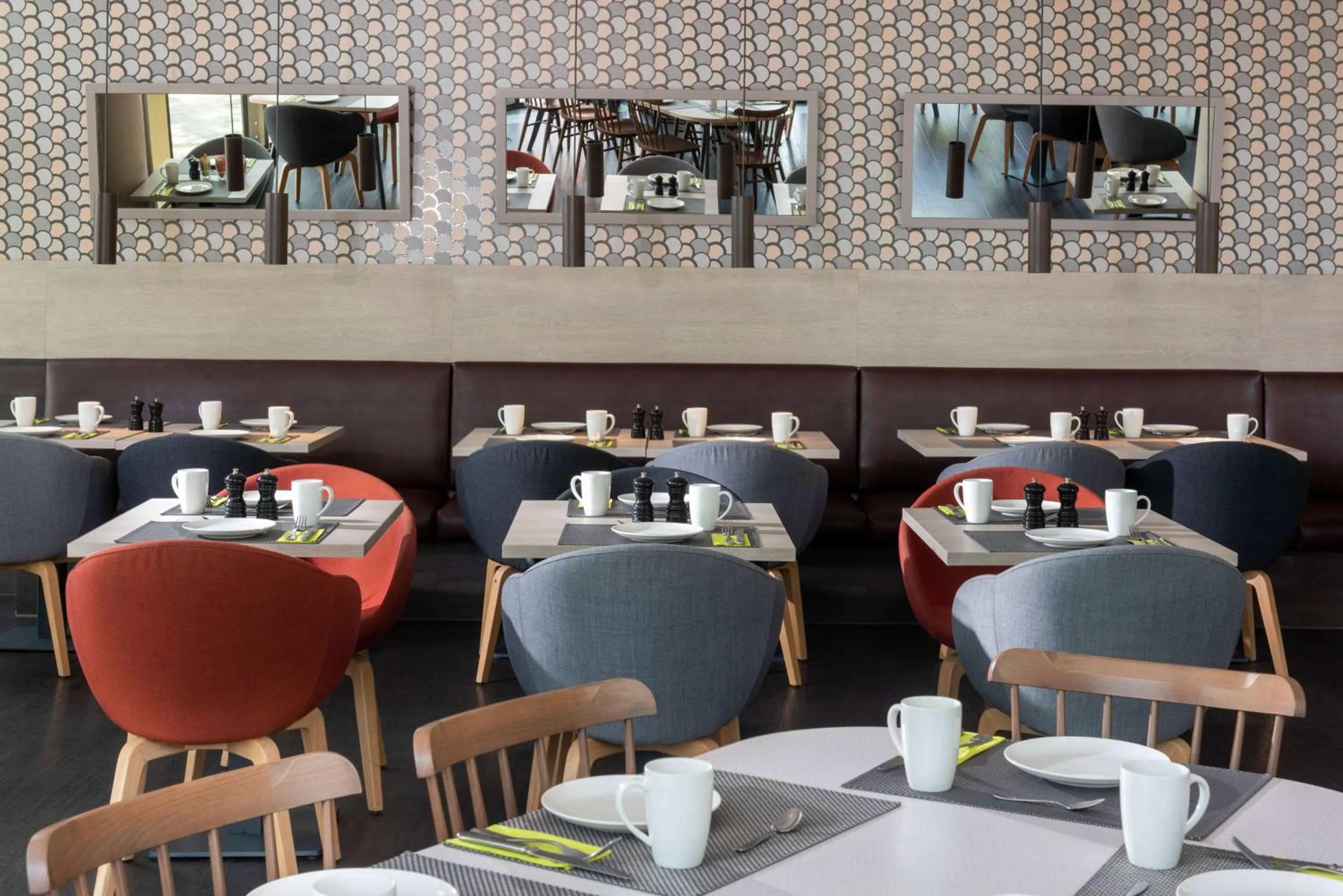 Restaurant/places to eat in Vienna House Easy by Wyndham Osnabrück City & Apartments