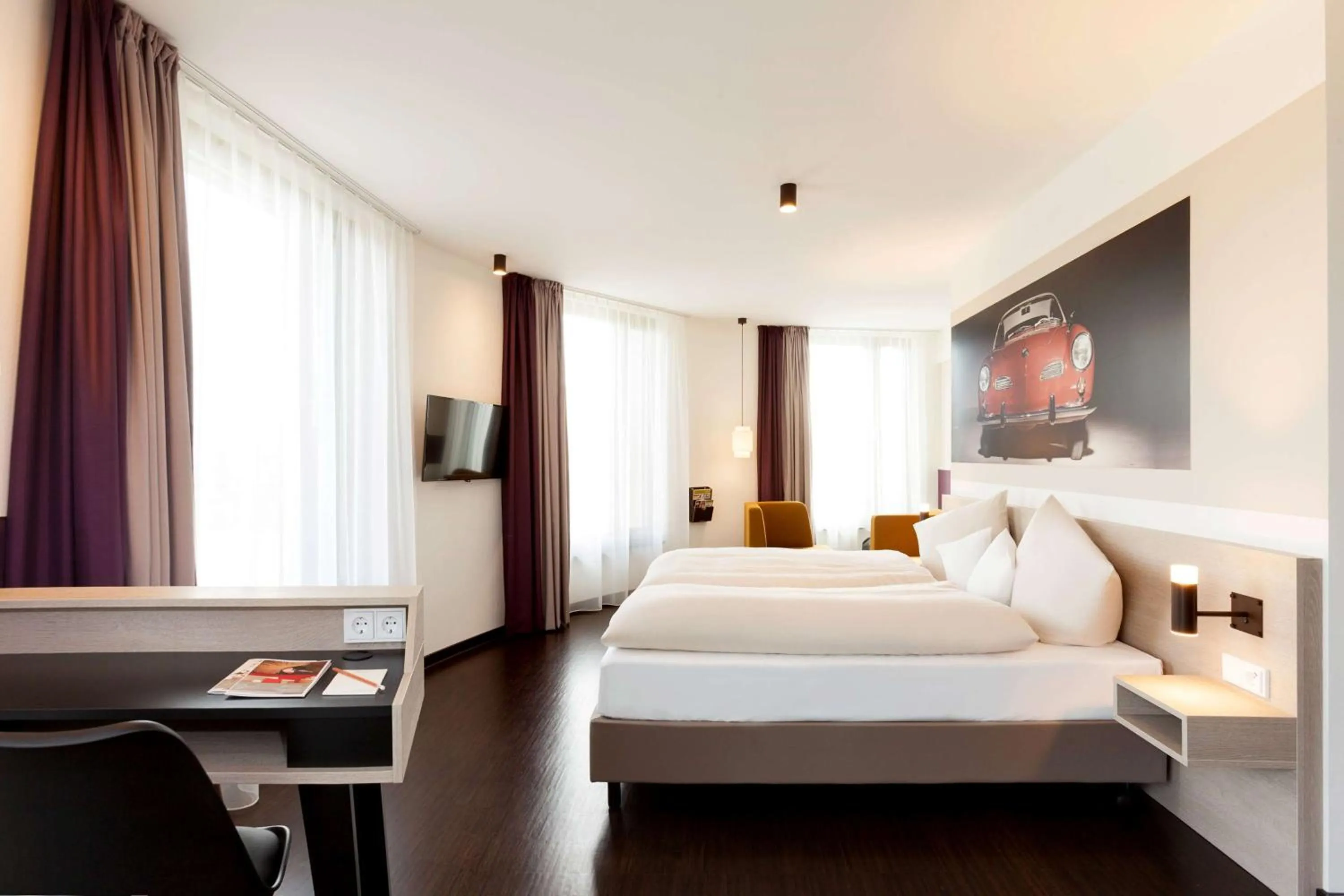 Bed in Vienna House Easy by Wyndham Osnabrück City & Apartments