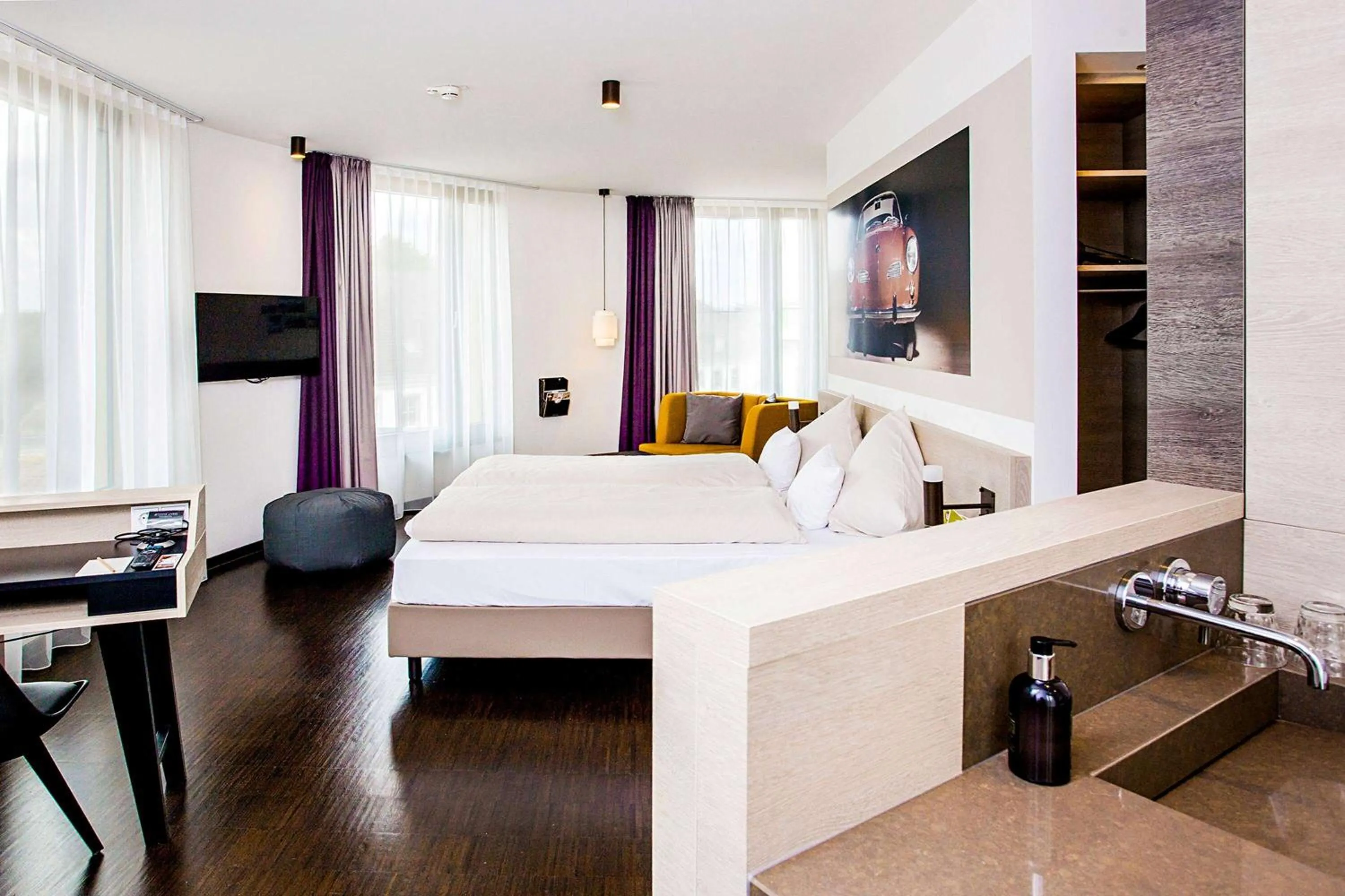 Bed in Vienna House Easy by Wyndham Osnabrück City & Apartments