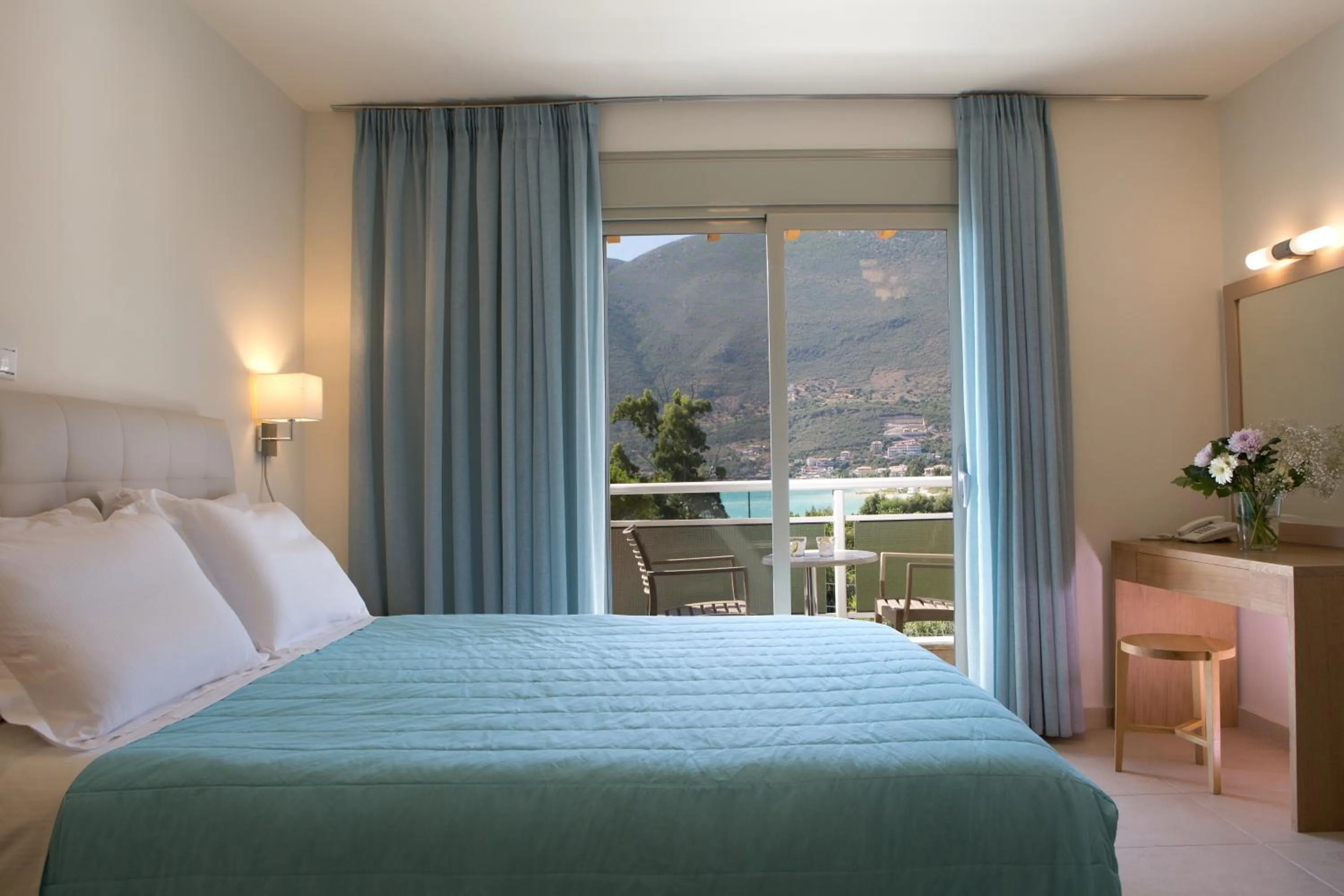 Bed in Grand TheoNi Boutique Hotel & Spa