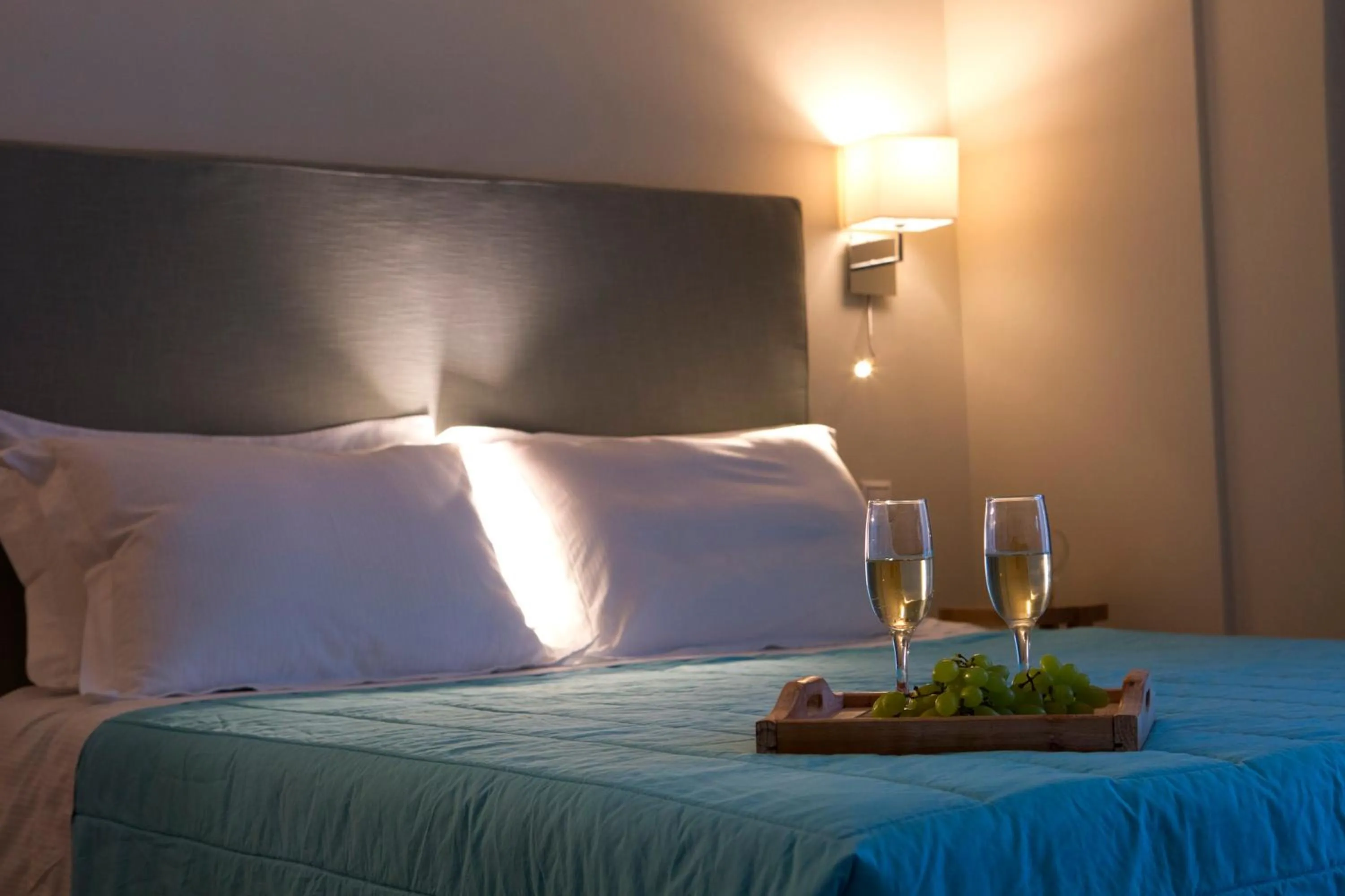 Bed in Grand TheoNi Boutique Hotel & Spa