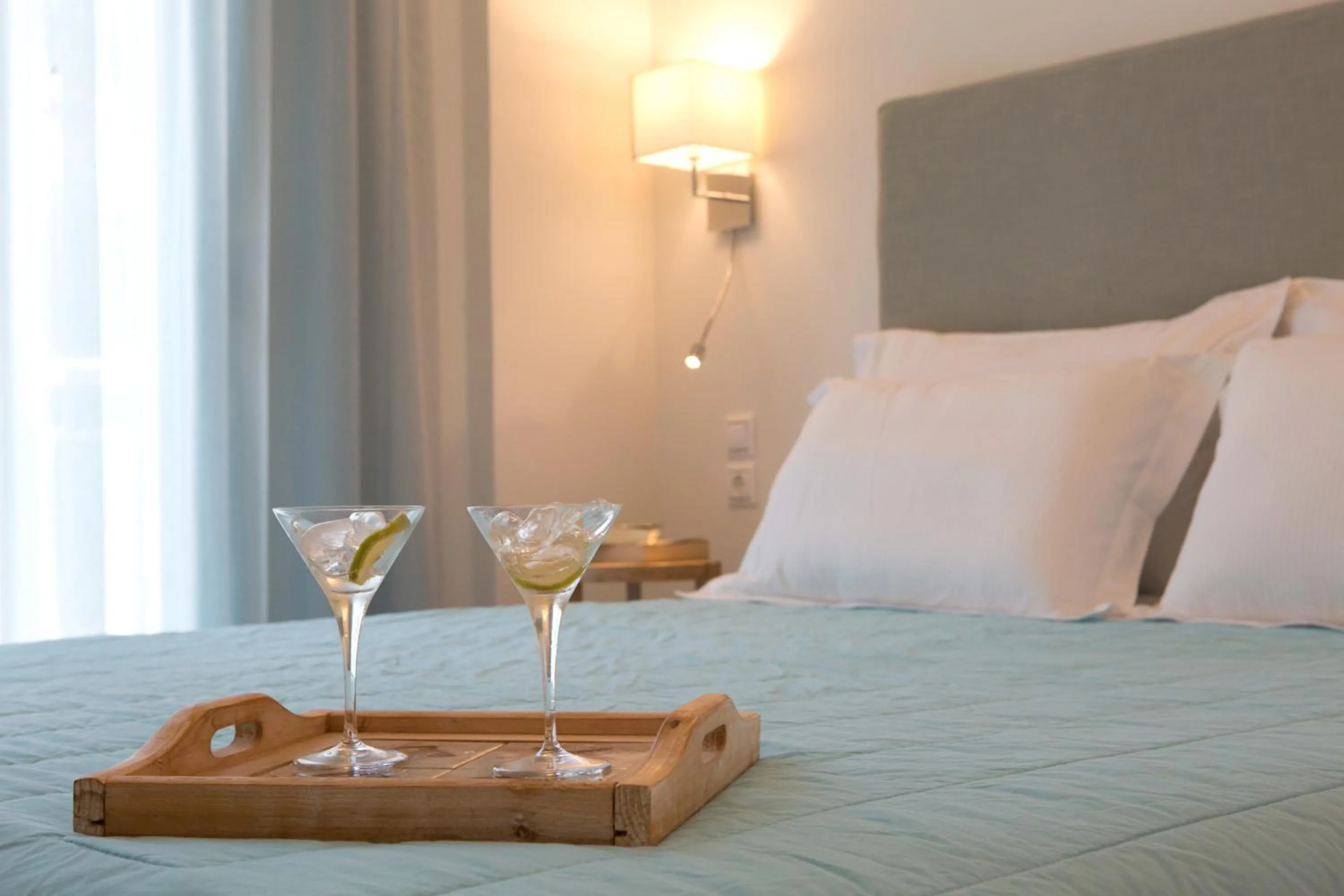 Bed in Grand TheoNi Boutique Hotel & Spa