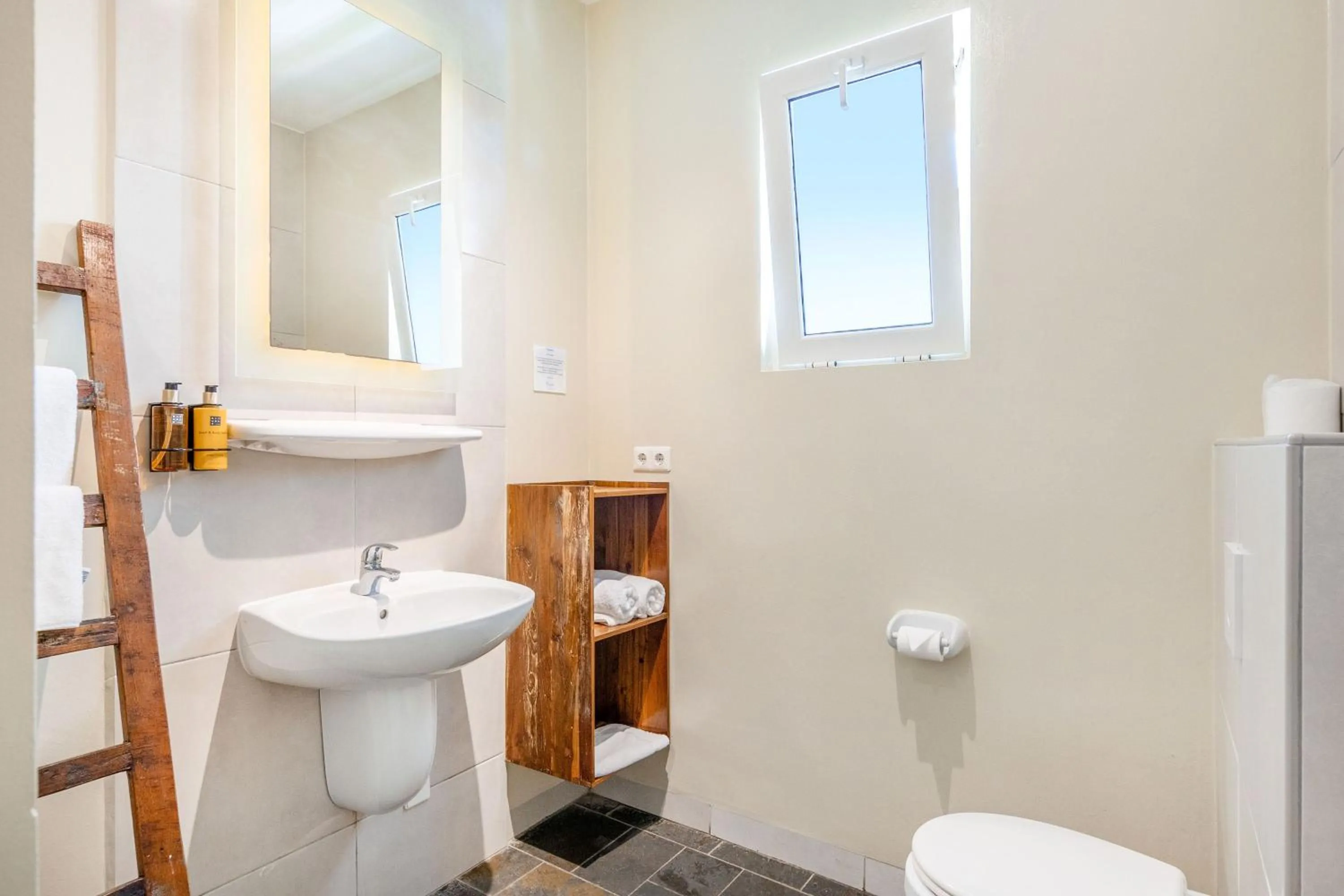 Toilet in Bayside Boutique Hotel - Blue Bay Golf & Beach Resort