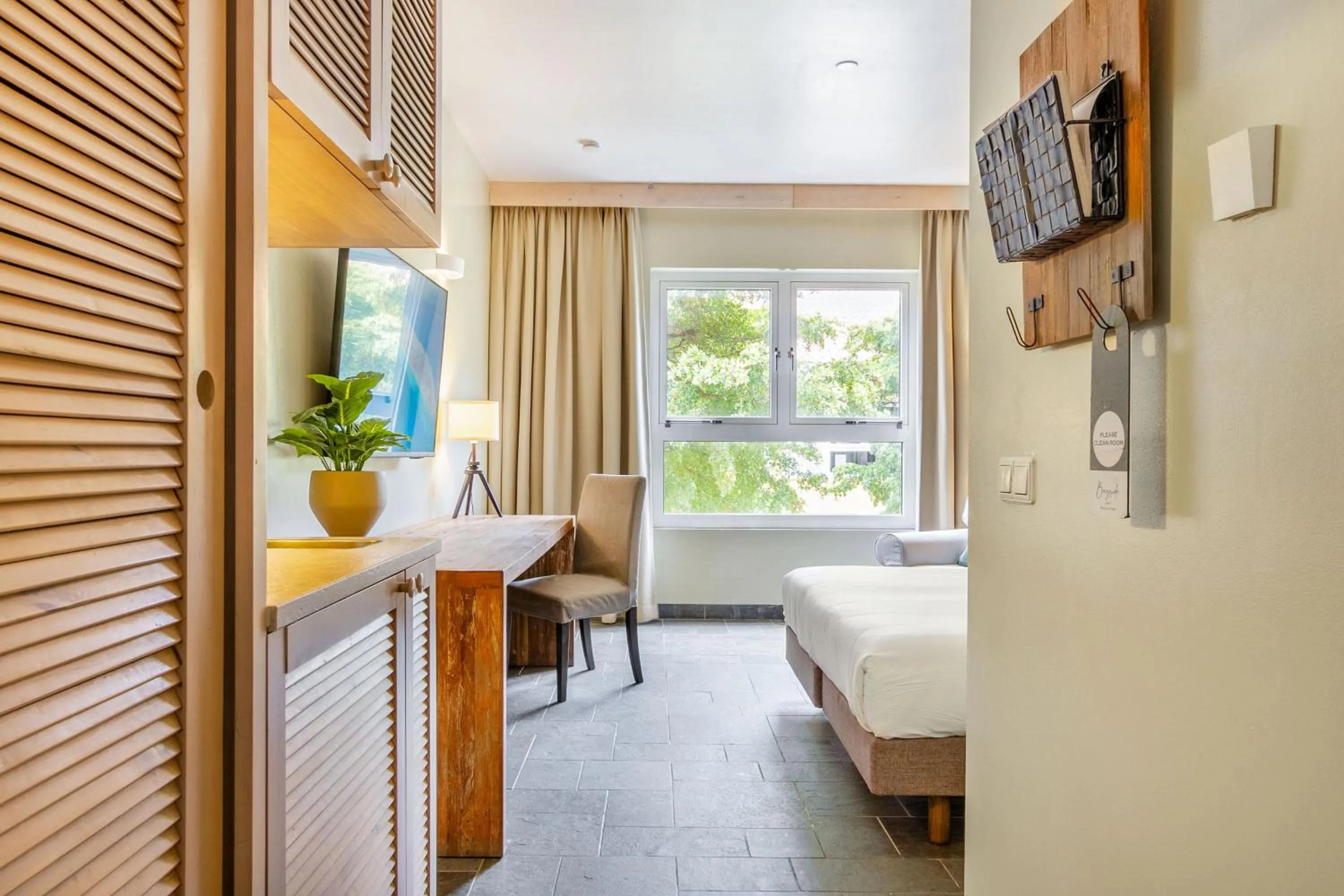 Bed in Bayside Boutique Hotel - Blue Bay Golf & Beach Resort