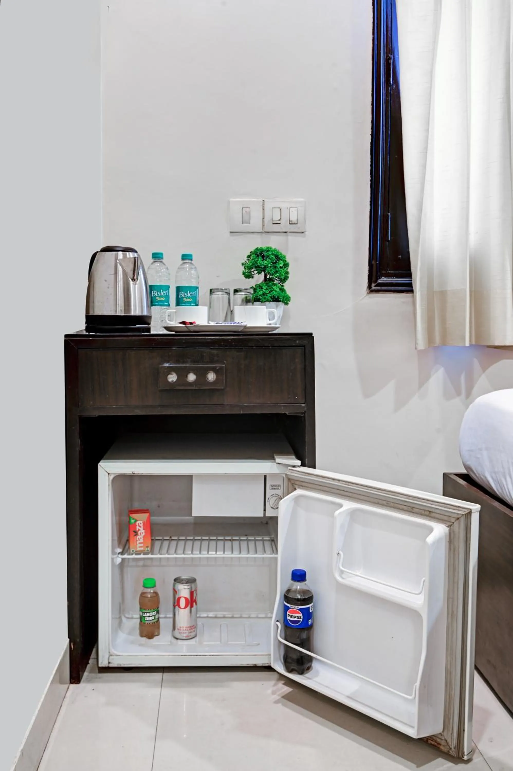 Photo of the whole room, Bed in Hotel Amby Inn by Quadis - Lajpat Nagar