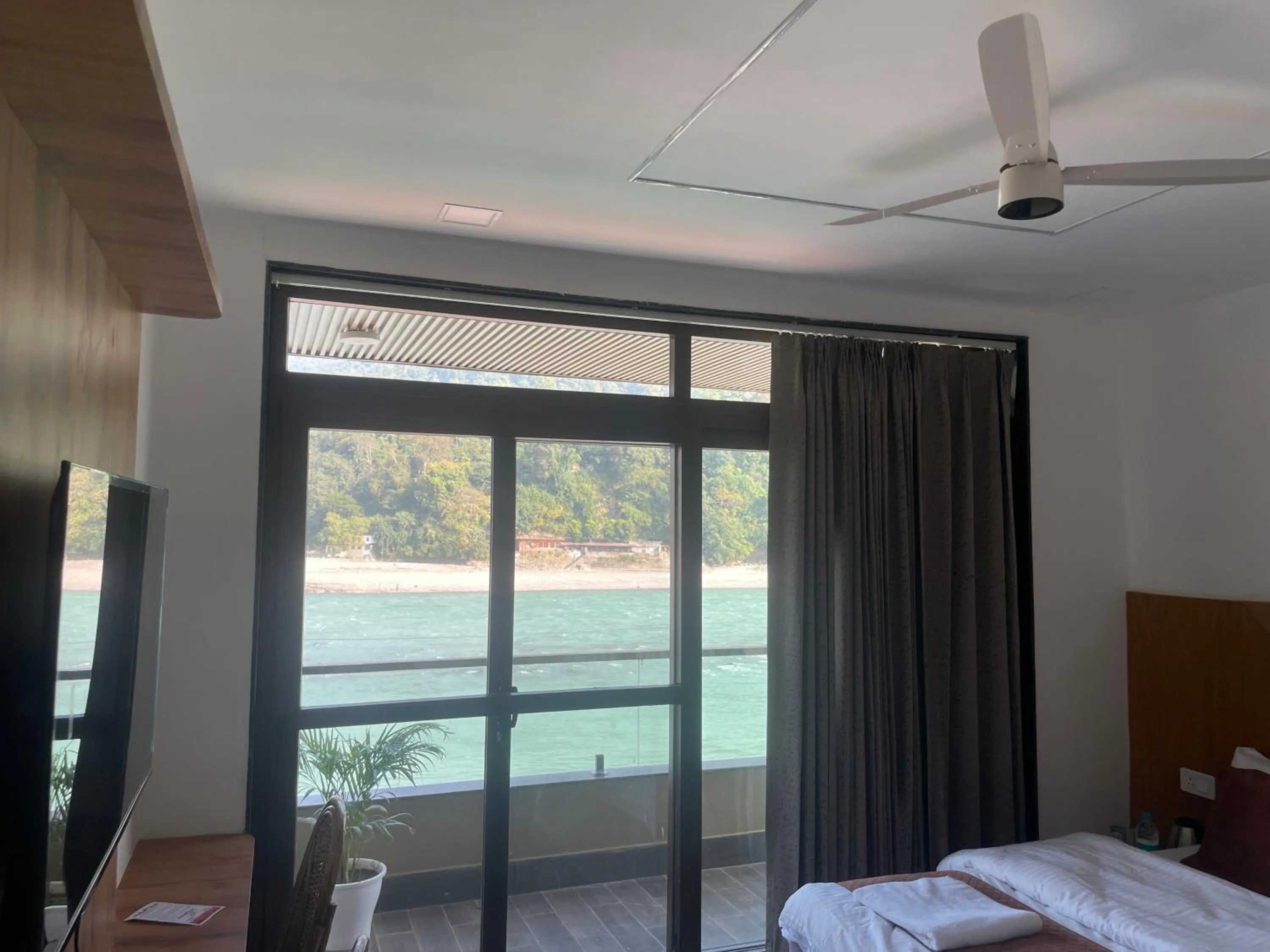 Bedroom, Bed in Maayaa inn by Ganges