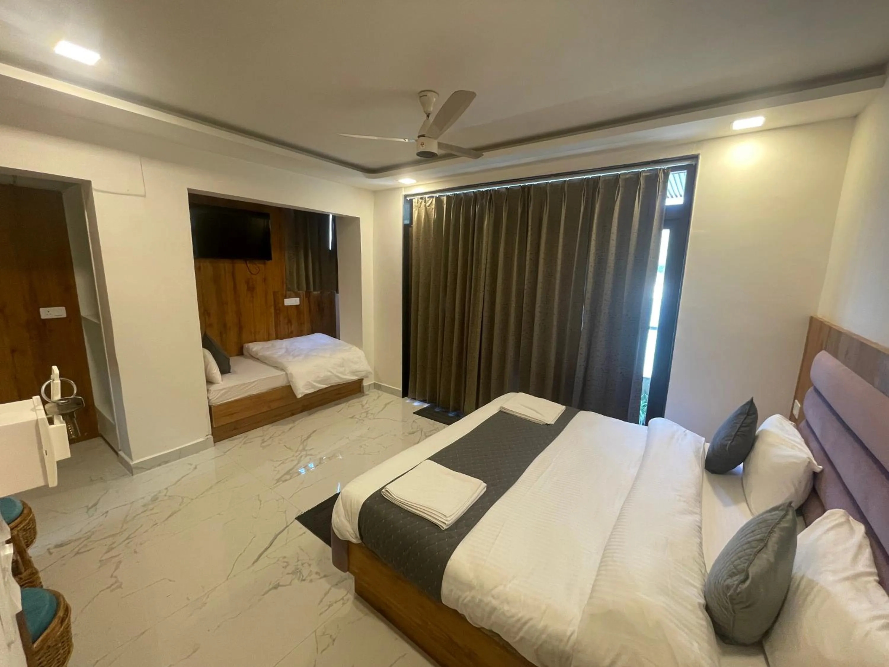 Photo of the whole room, Bed in Maayaa inn by Ganges