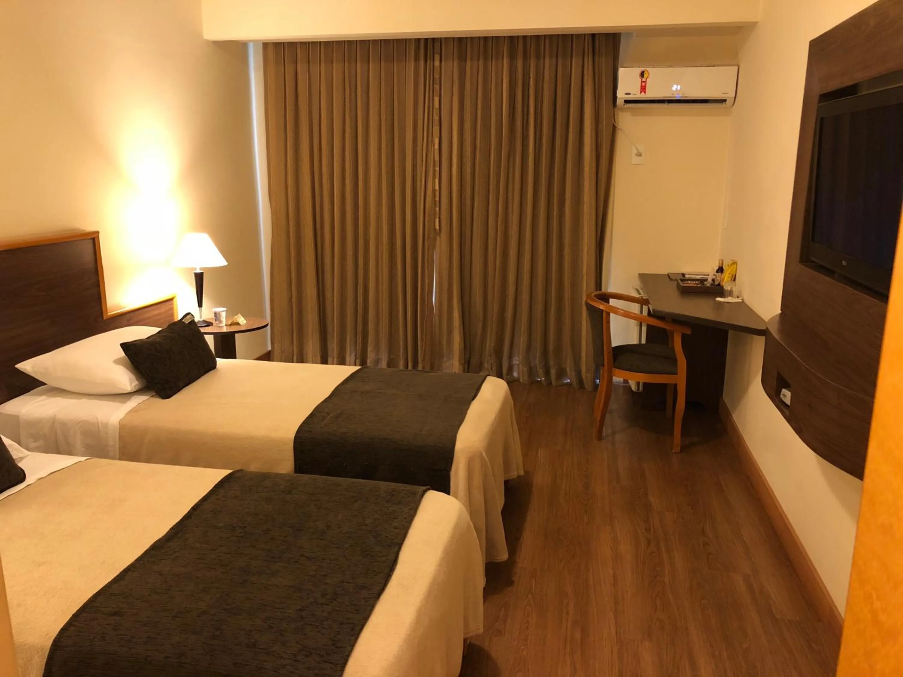 Bed in Gran Continental Hotel Taubaté