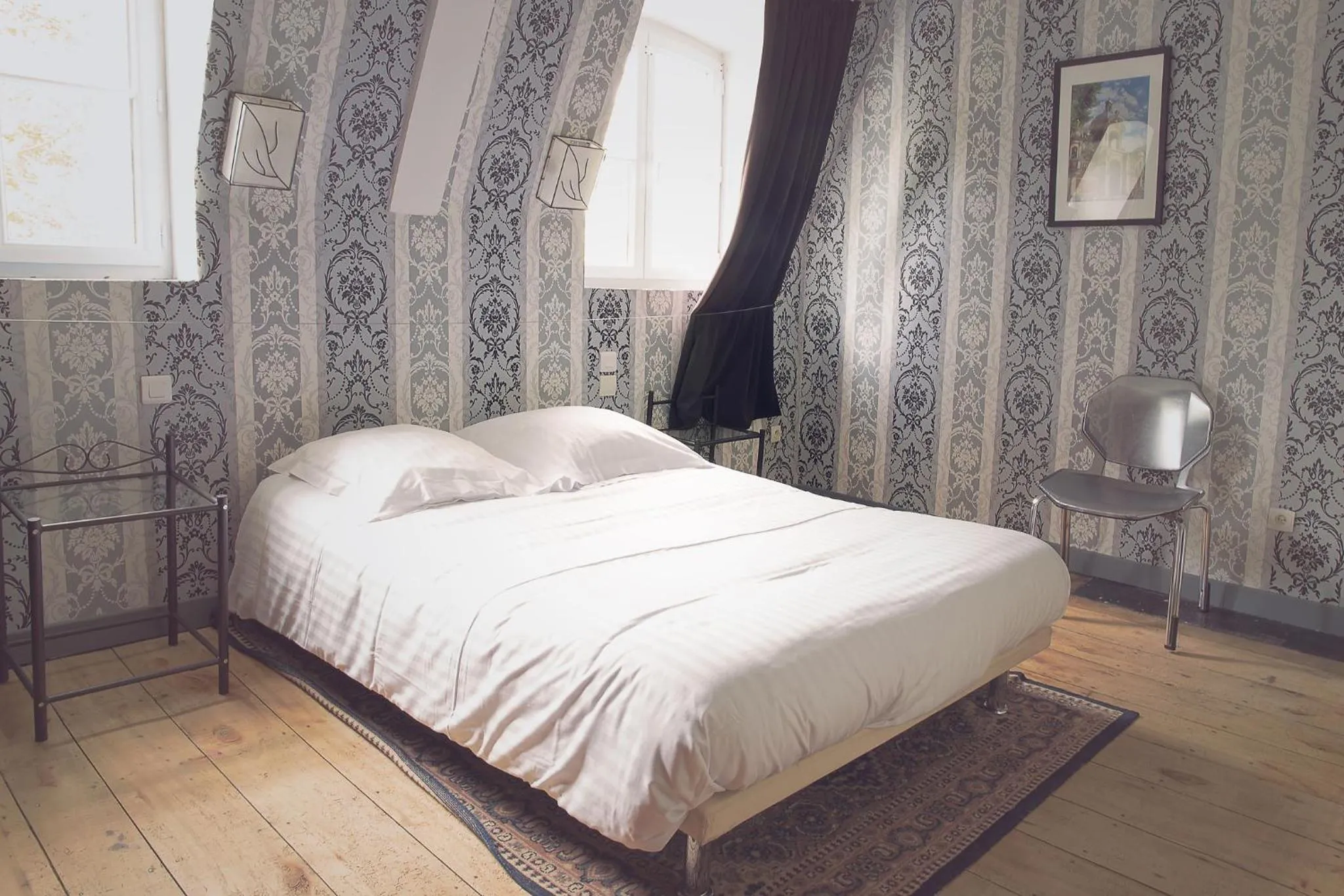 Photo of the whole room, Bed in Chateau De Grosfy