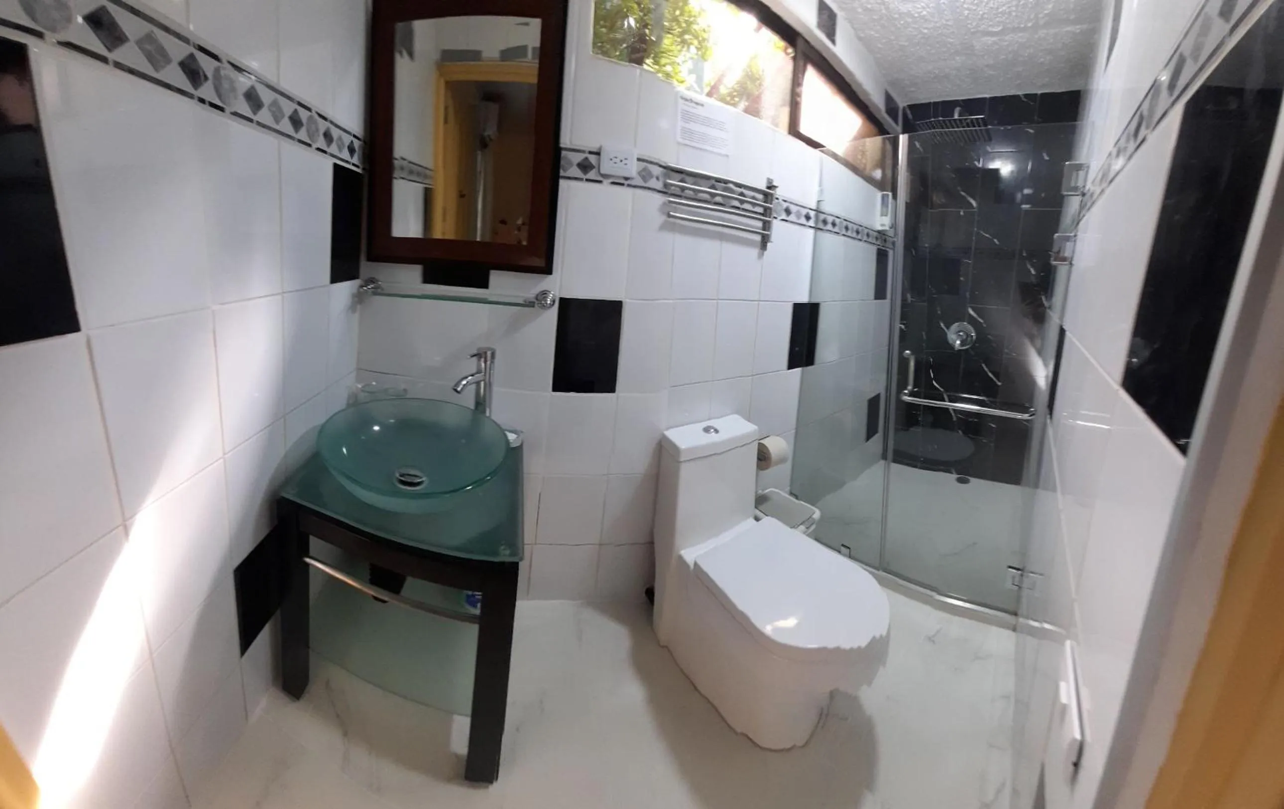 Bathroom in Coyaba Tropical Elegant Adult Guesthouse