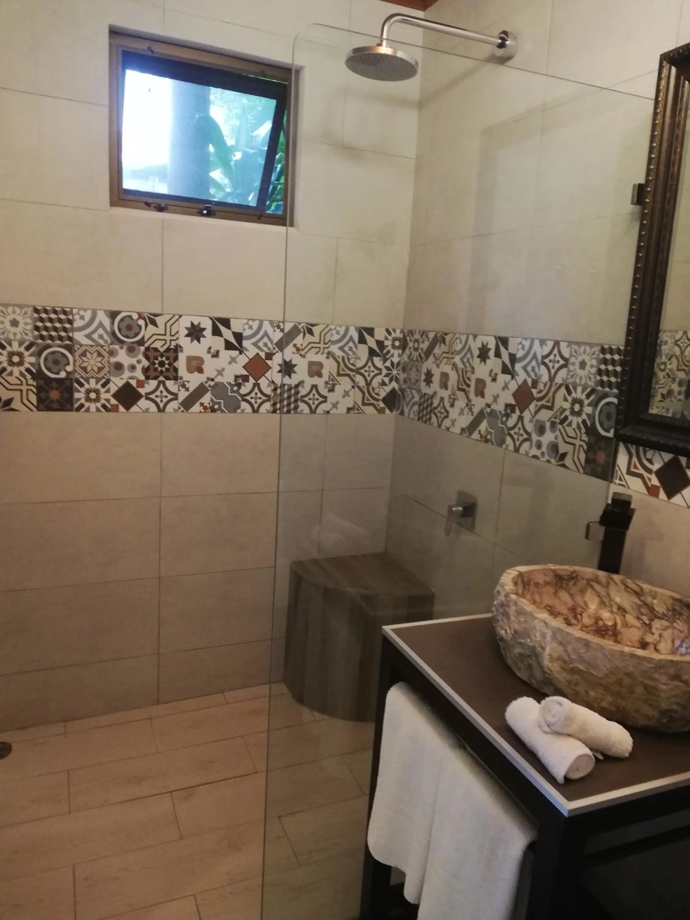 Shower in Coyaba Tropical Elegant Adult Guesthouse