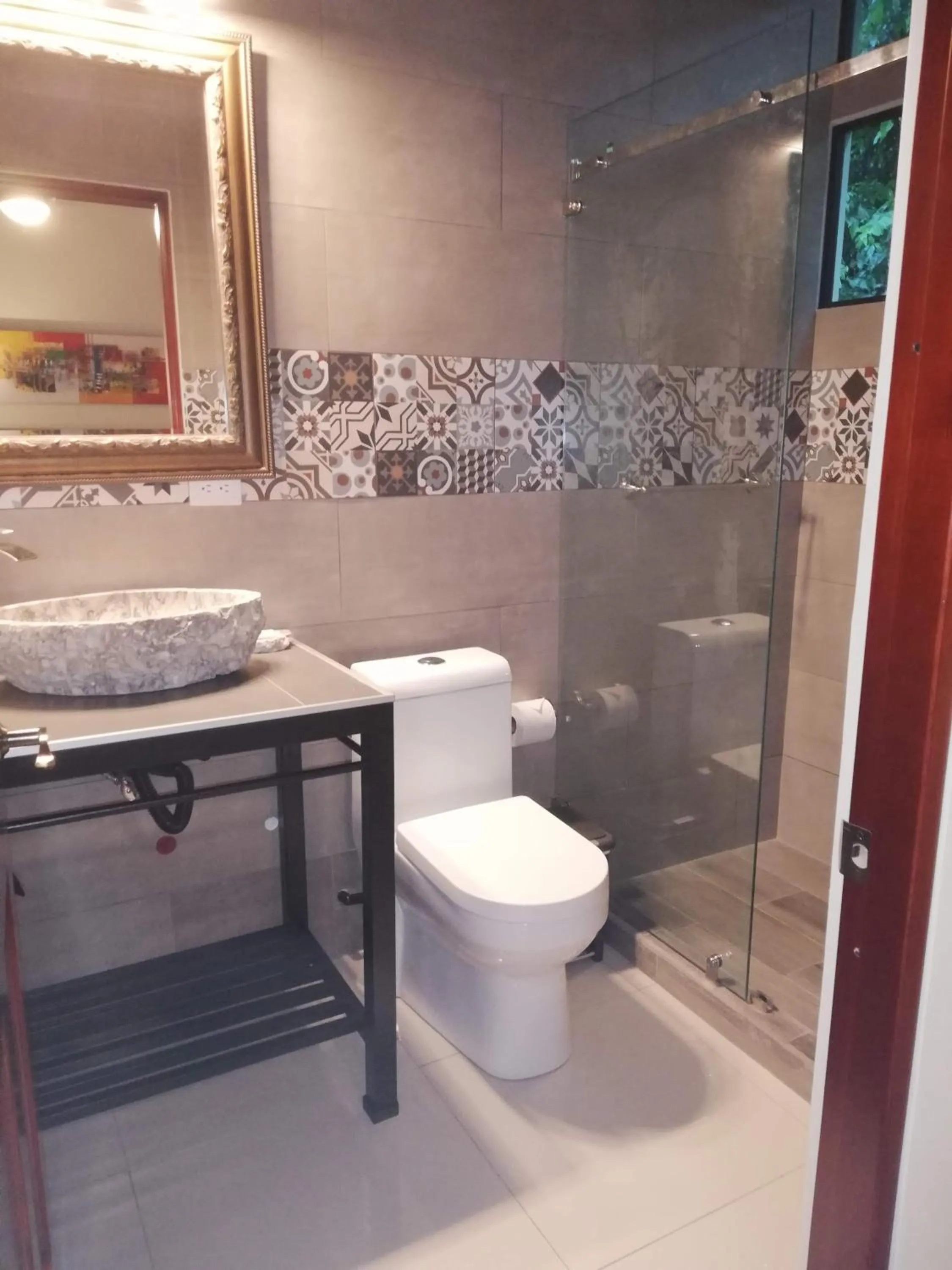 Shower in Coyaba Tropical Elegant Adult Guesthouse