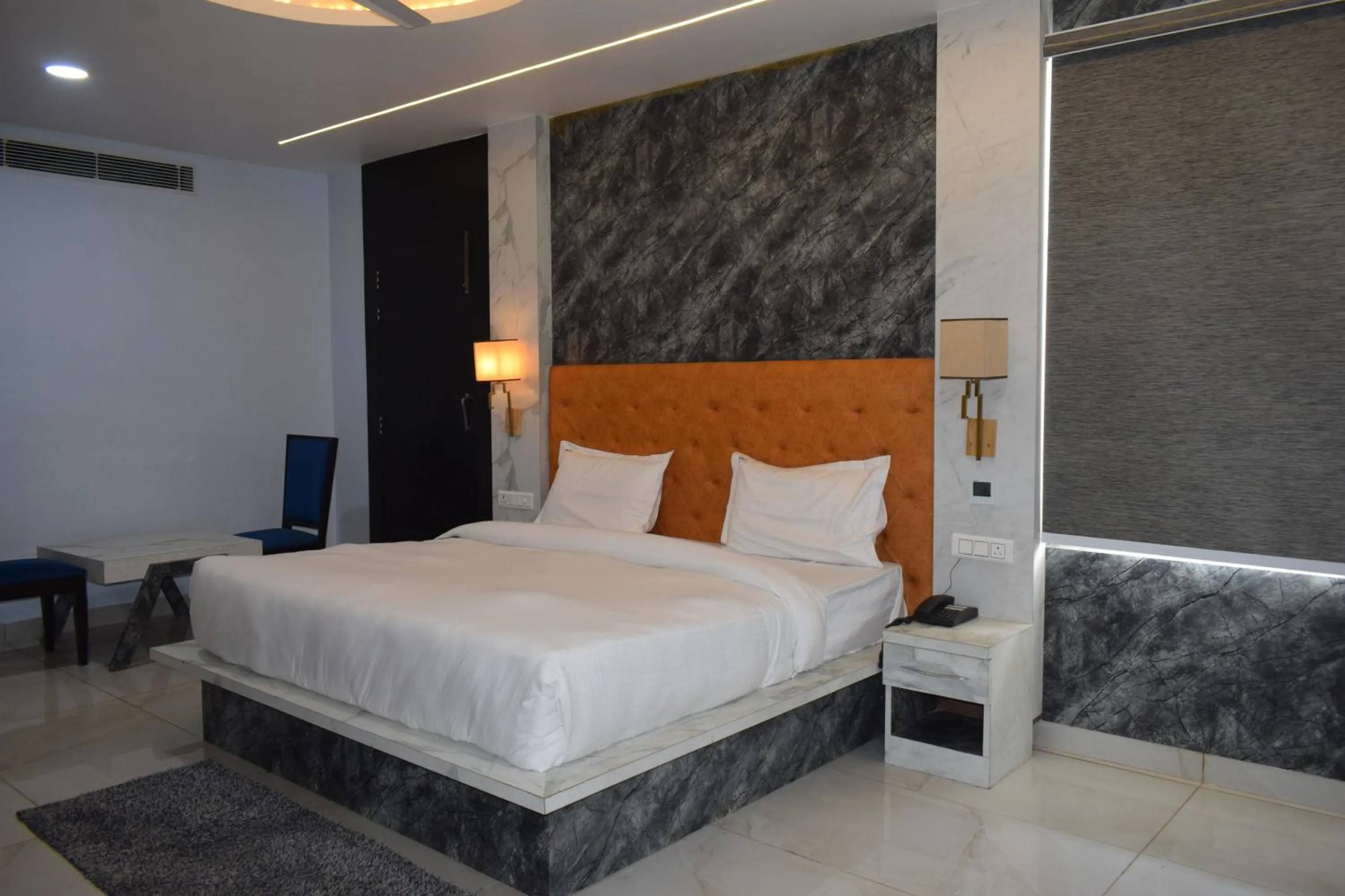 Bedroom, Bed in Country Ambience Hotel By Jags City Mall