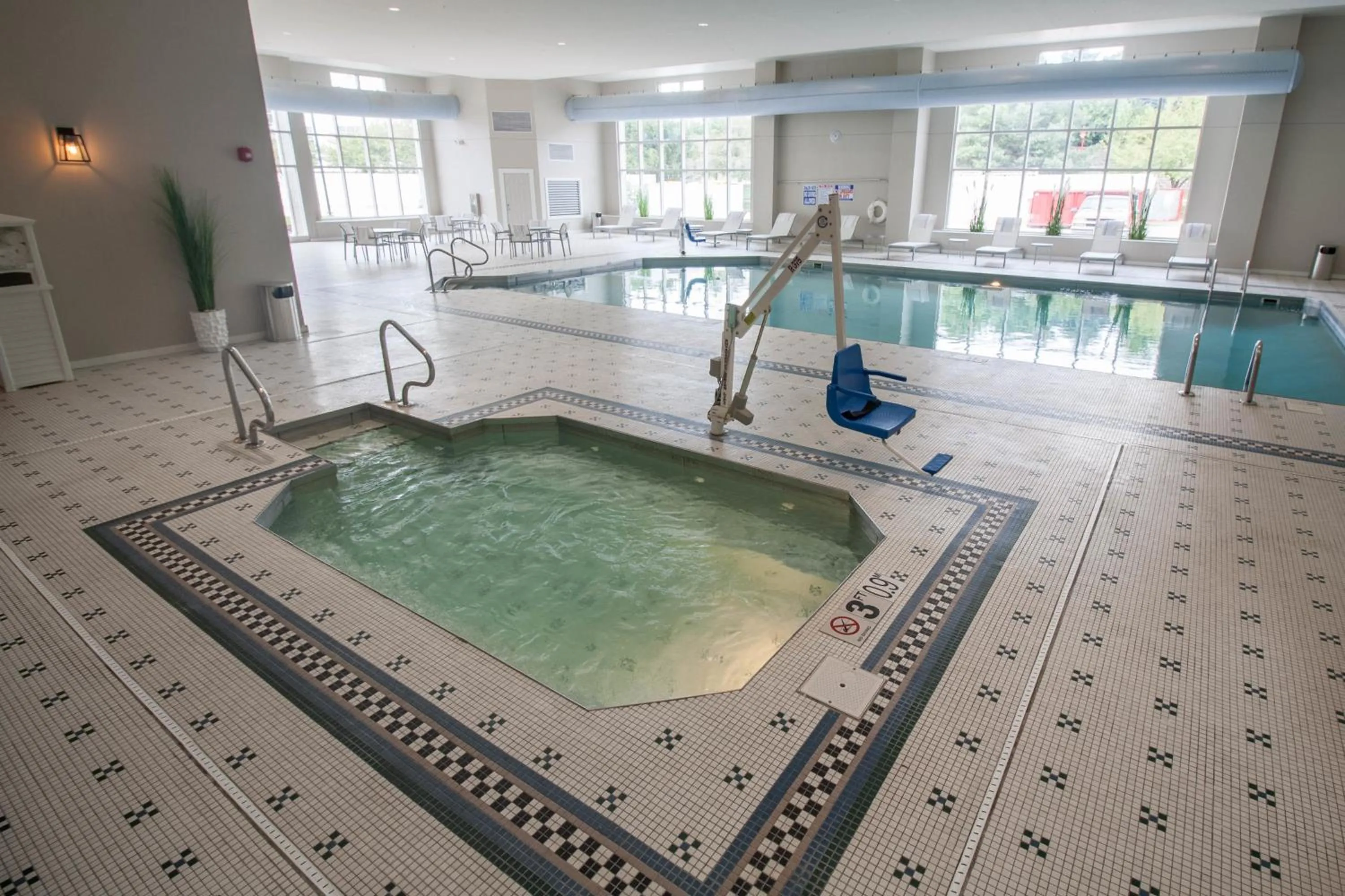 Swimming pool in Hotel Renovo Des Moines Urbandale,Tapestry Collection Hilton