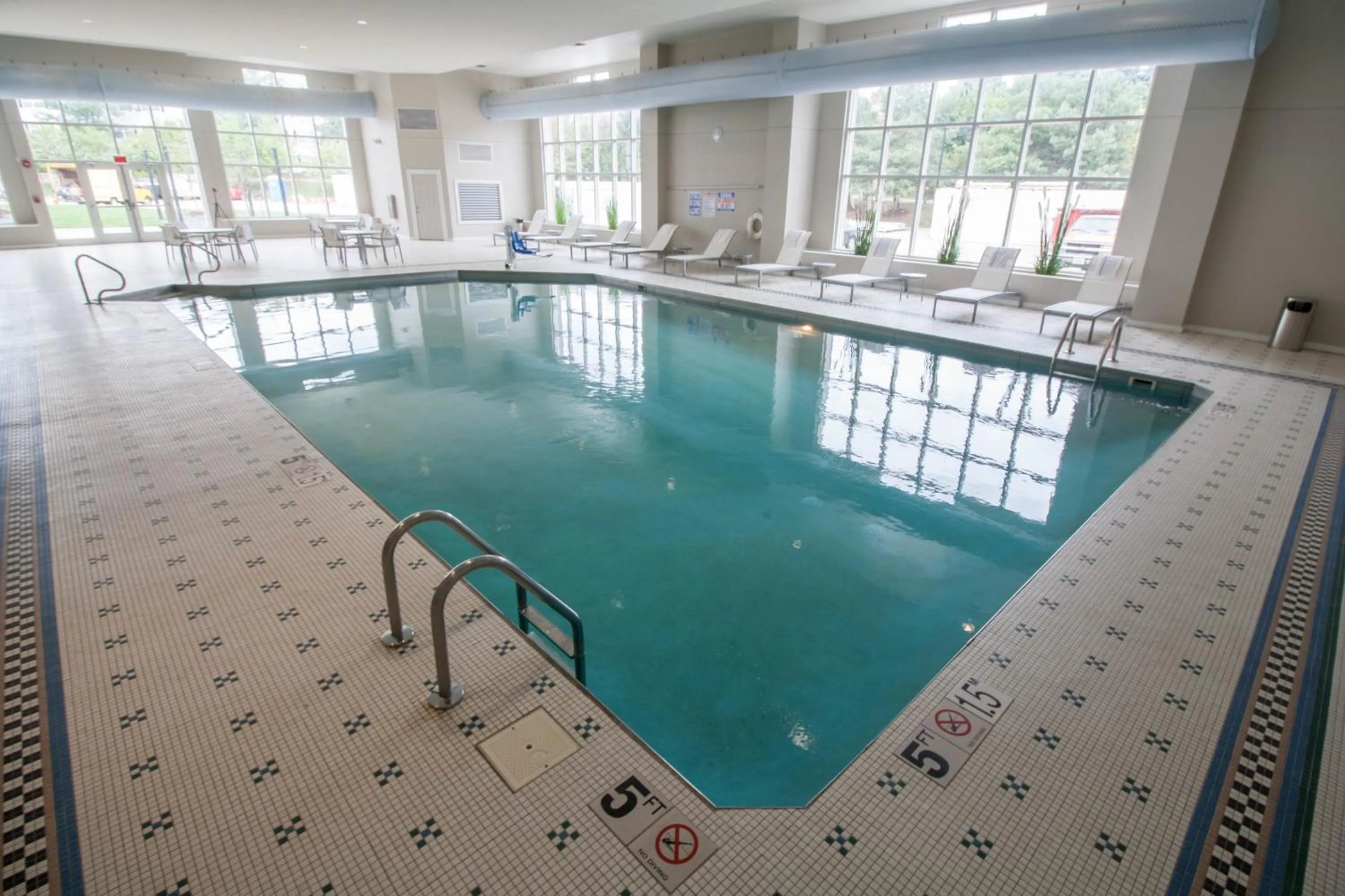 Swimming pool in Hotel Renovo Des Moines Urbandale,Tapestry Collection Hilton