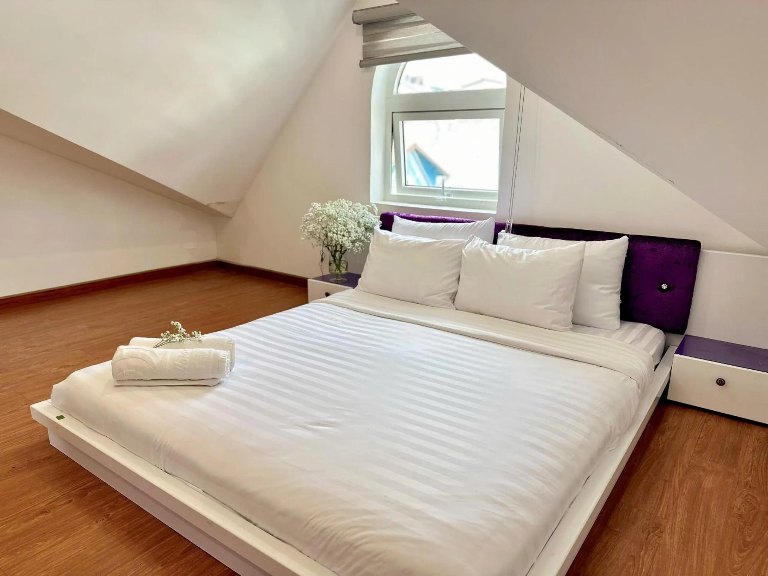 Bed in Moc Nha Minh Hotel Da Lat