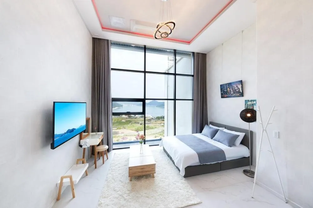 Bed in Geoje Harakeke Pension