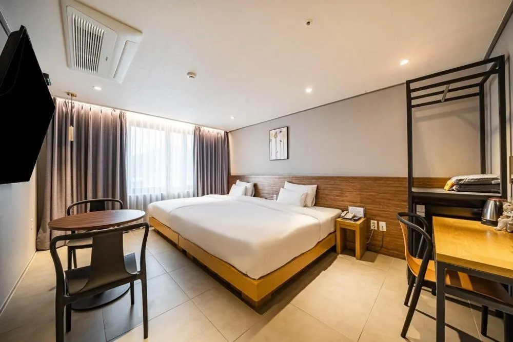 Bed in Andong Case Hotel