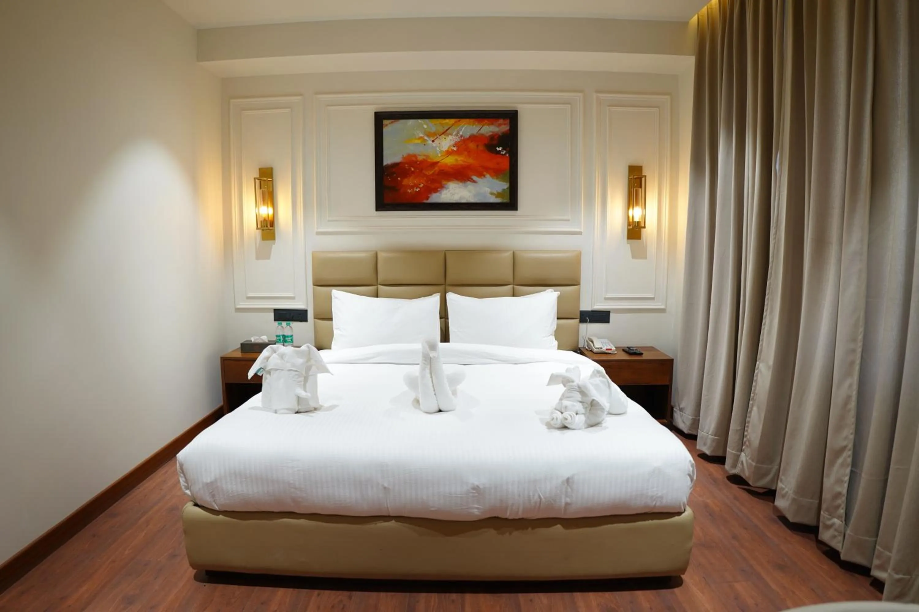 Bed in The Royal Velvet Hotel & Resort