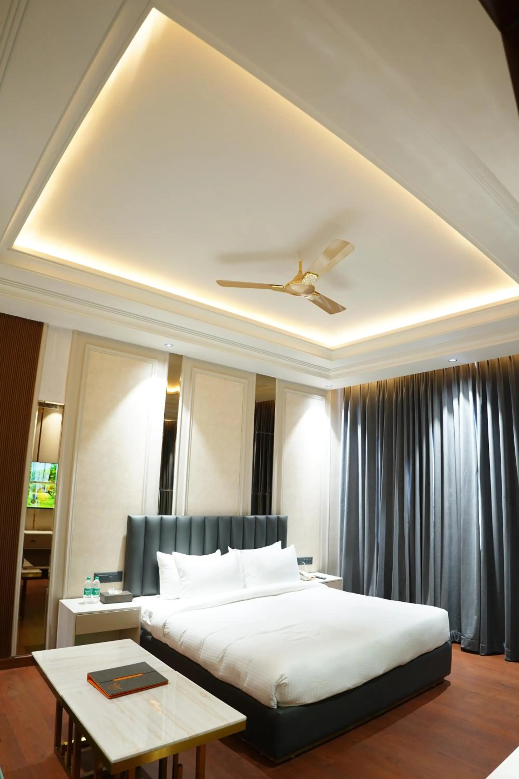 Bed in The Royal Velvet Hotel & Resort