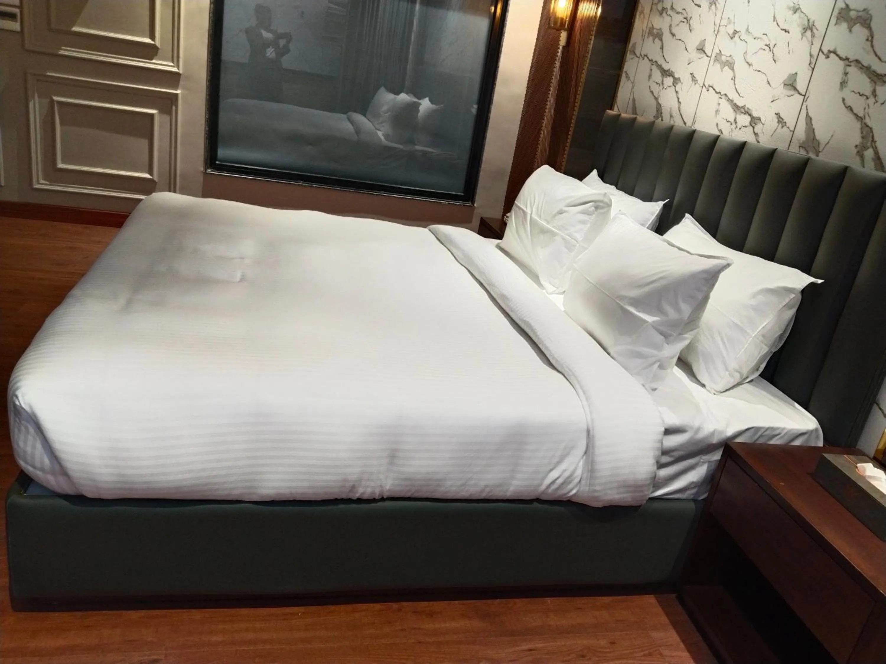 Bed in The Royal Velvet Hotel & Resort