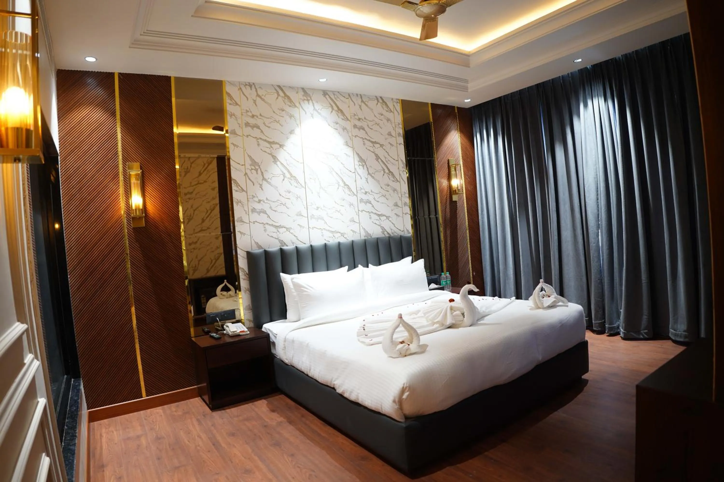 Bed in The Royal Velvet Hotel & Resort