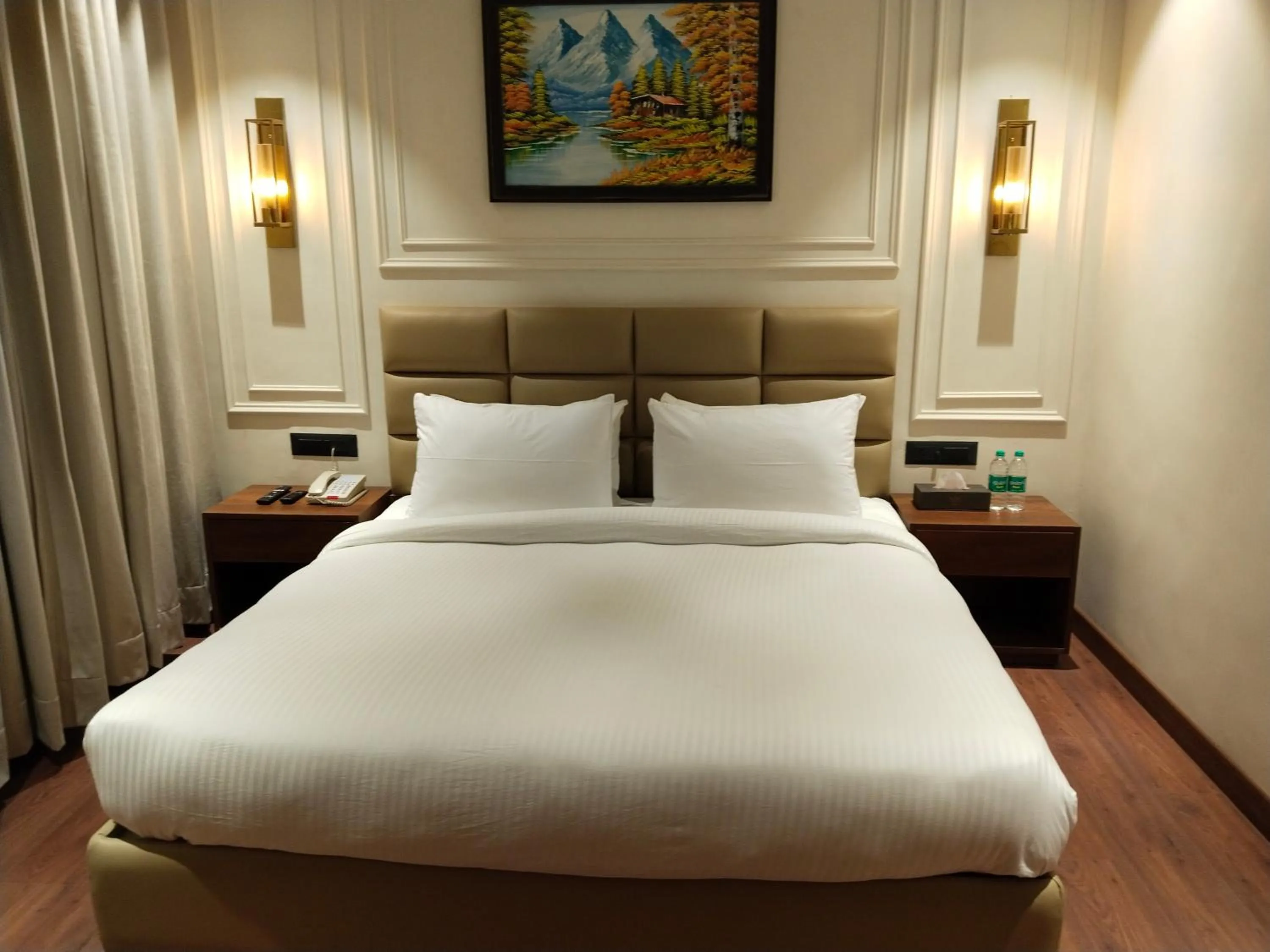 Bed in The Royal Velvet Hotel & Resort