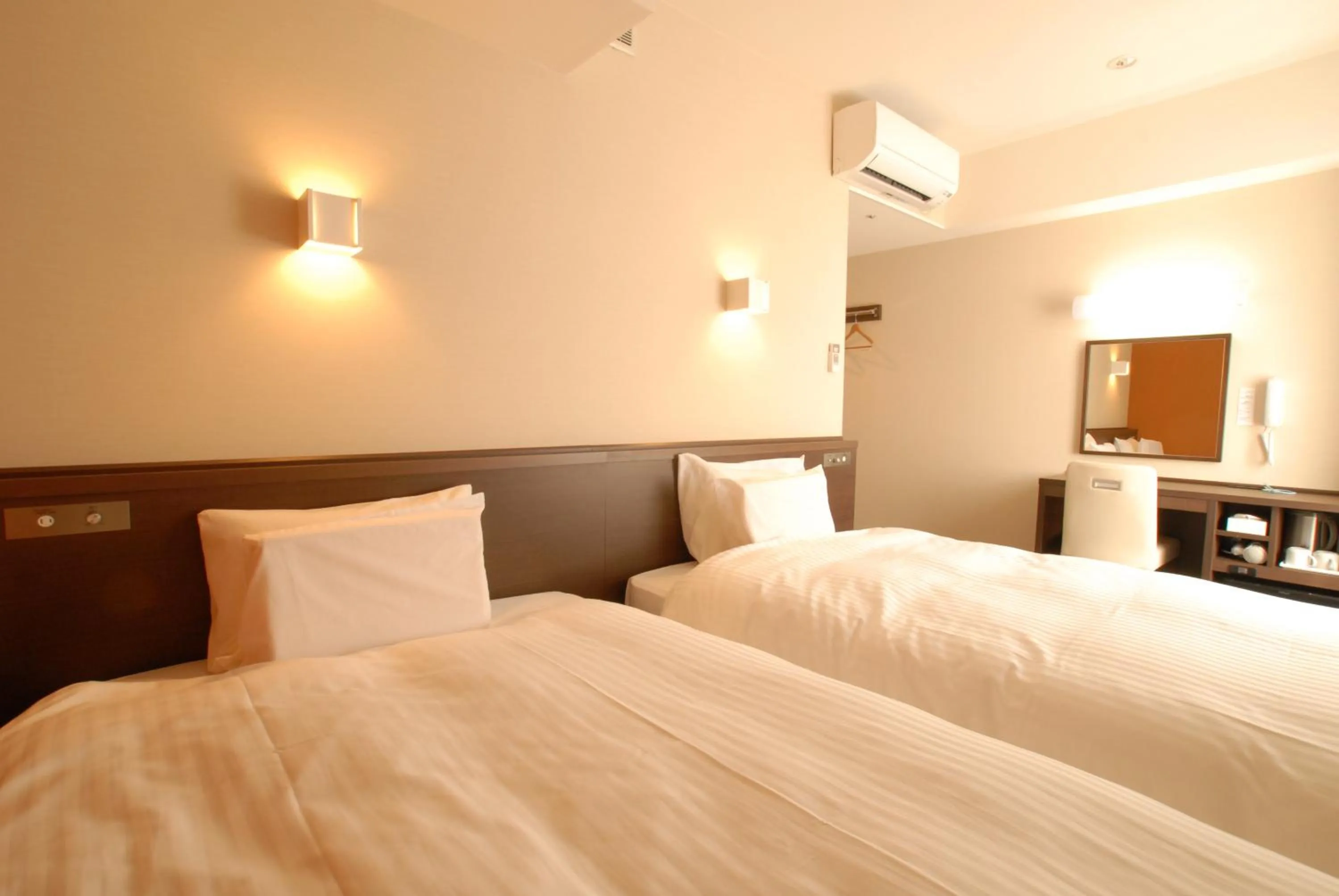 Bed in AB Hotel Kanazawa