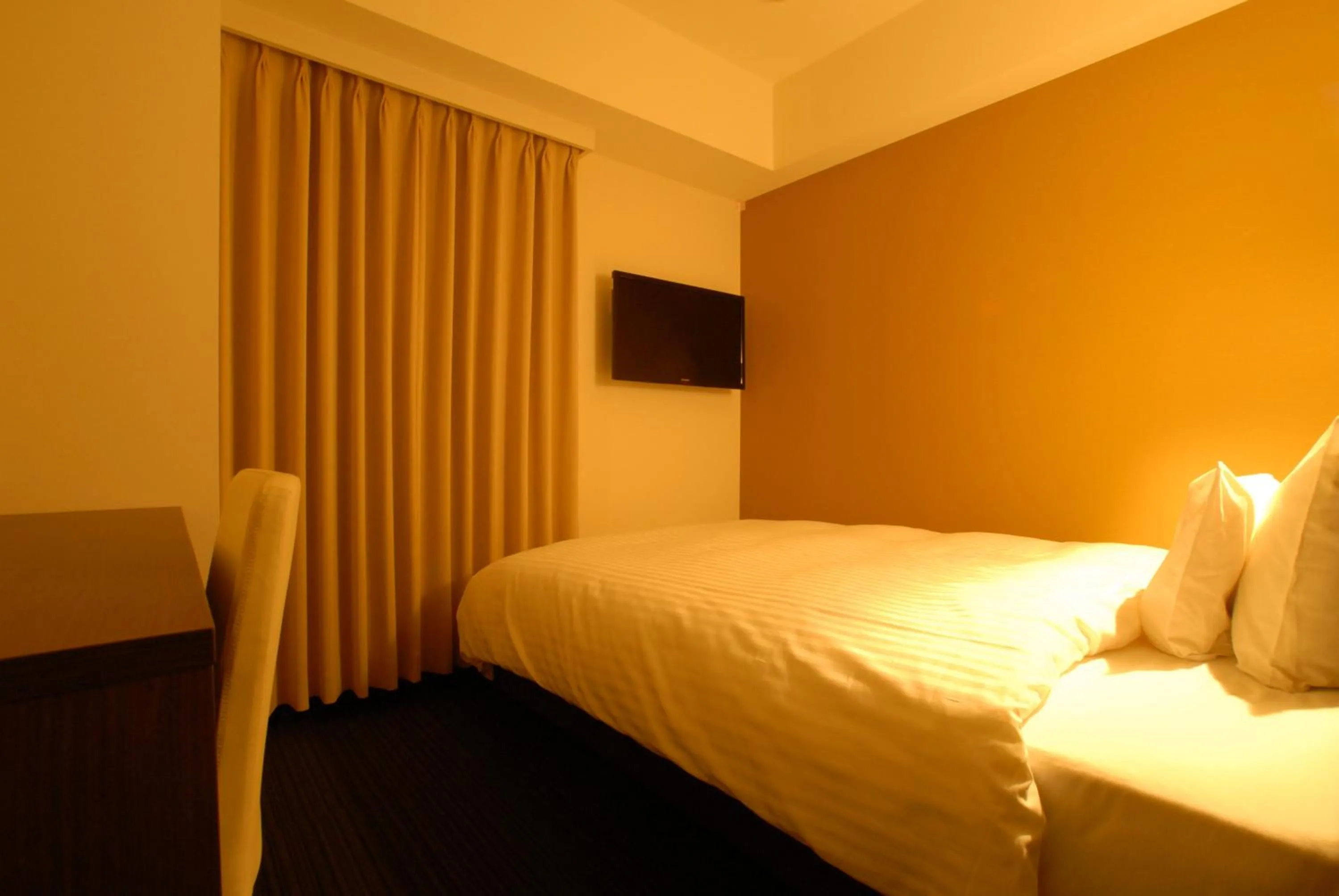 Bed in AB Hotel Kanazawa