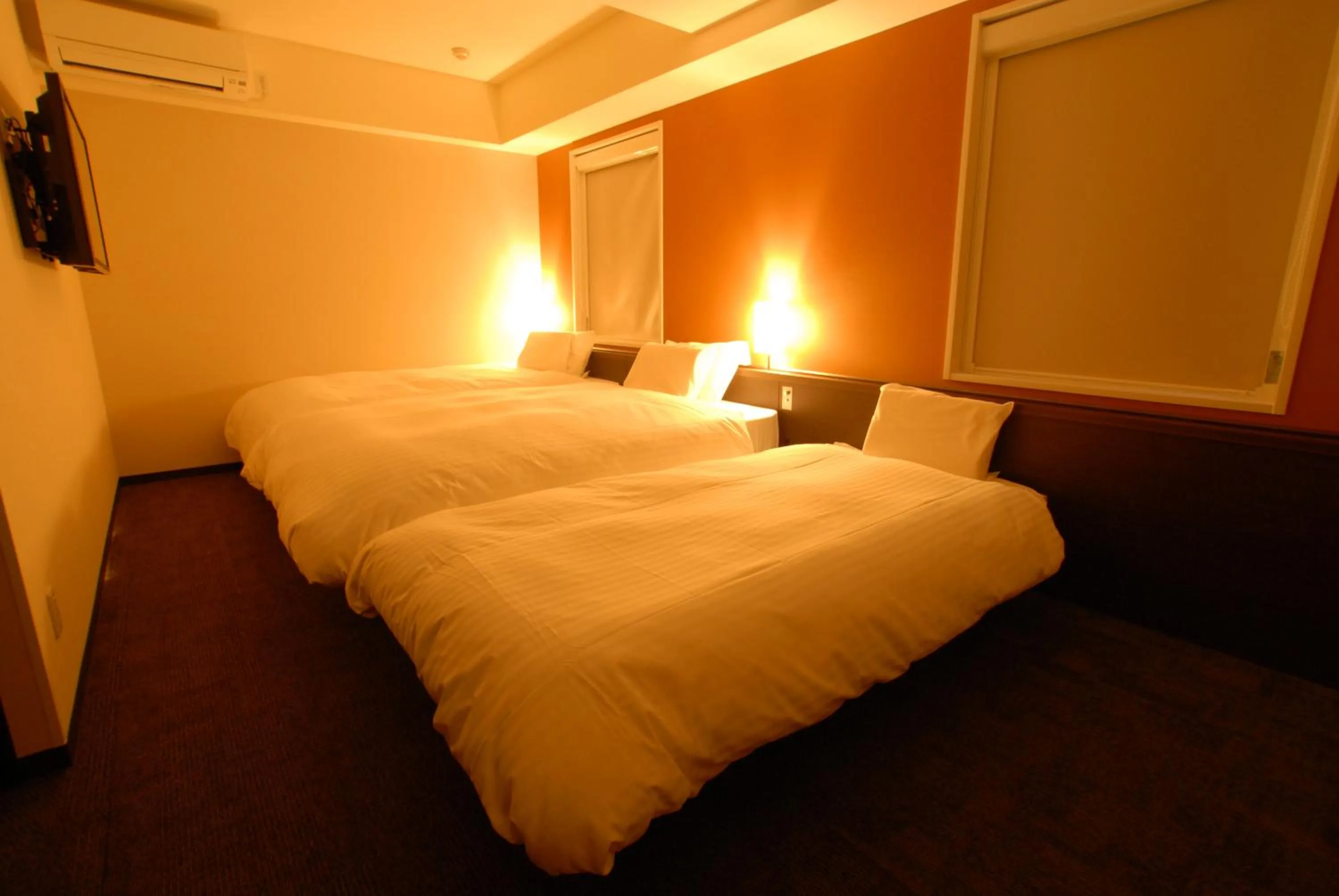 Bed in AB Hotel Kanazawa