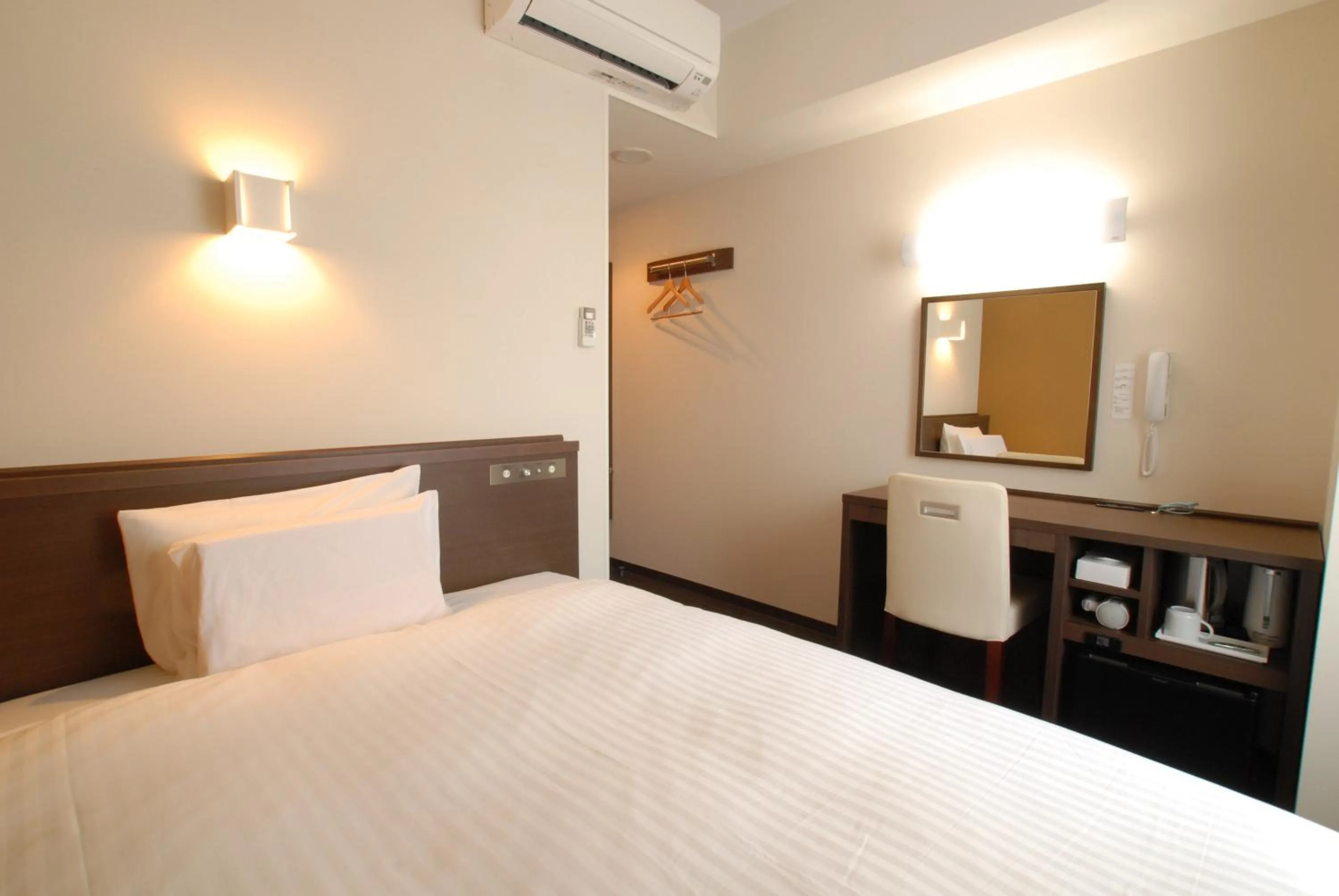 Bed in AB Hotel Kanazawa