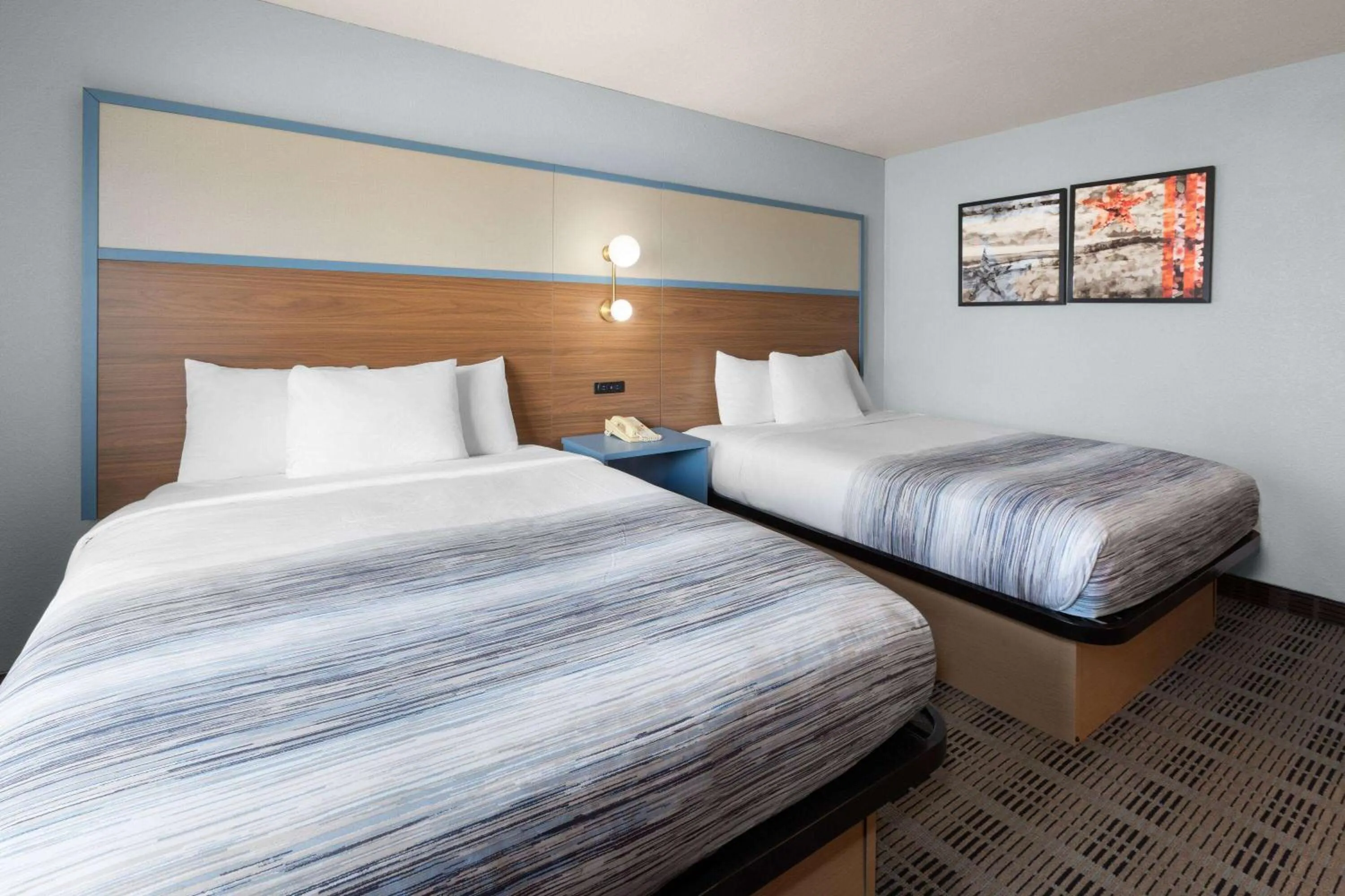 Photo of the whole room, Bed in AmericInn by Wyndham Oscoda Near AuSable River