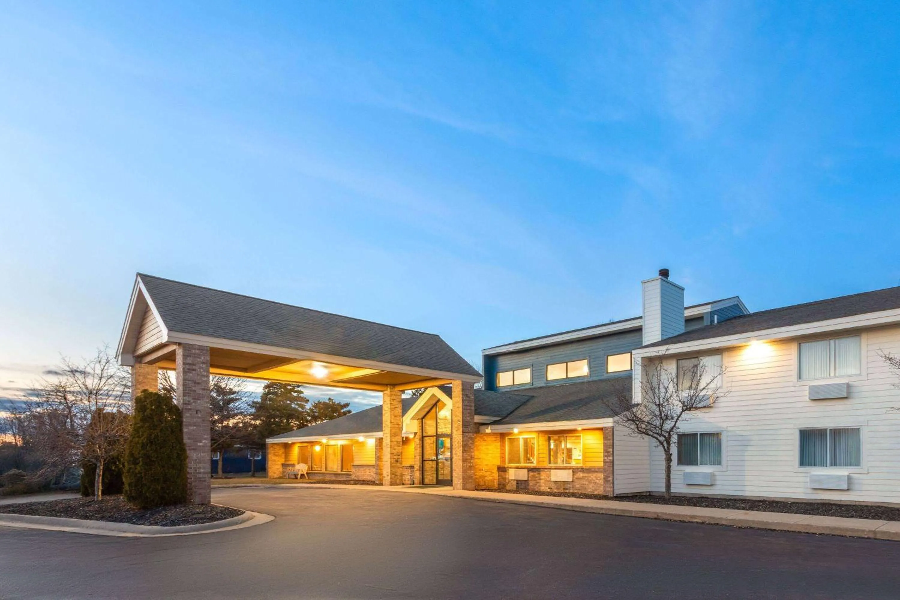 Property building in AmericInn by Wyndham Oscoda Near AuSable River