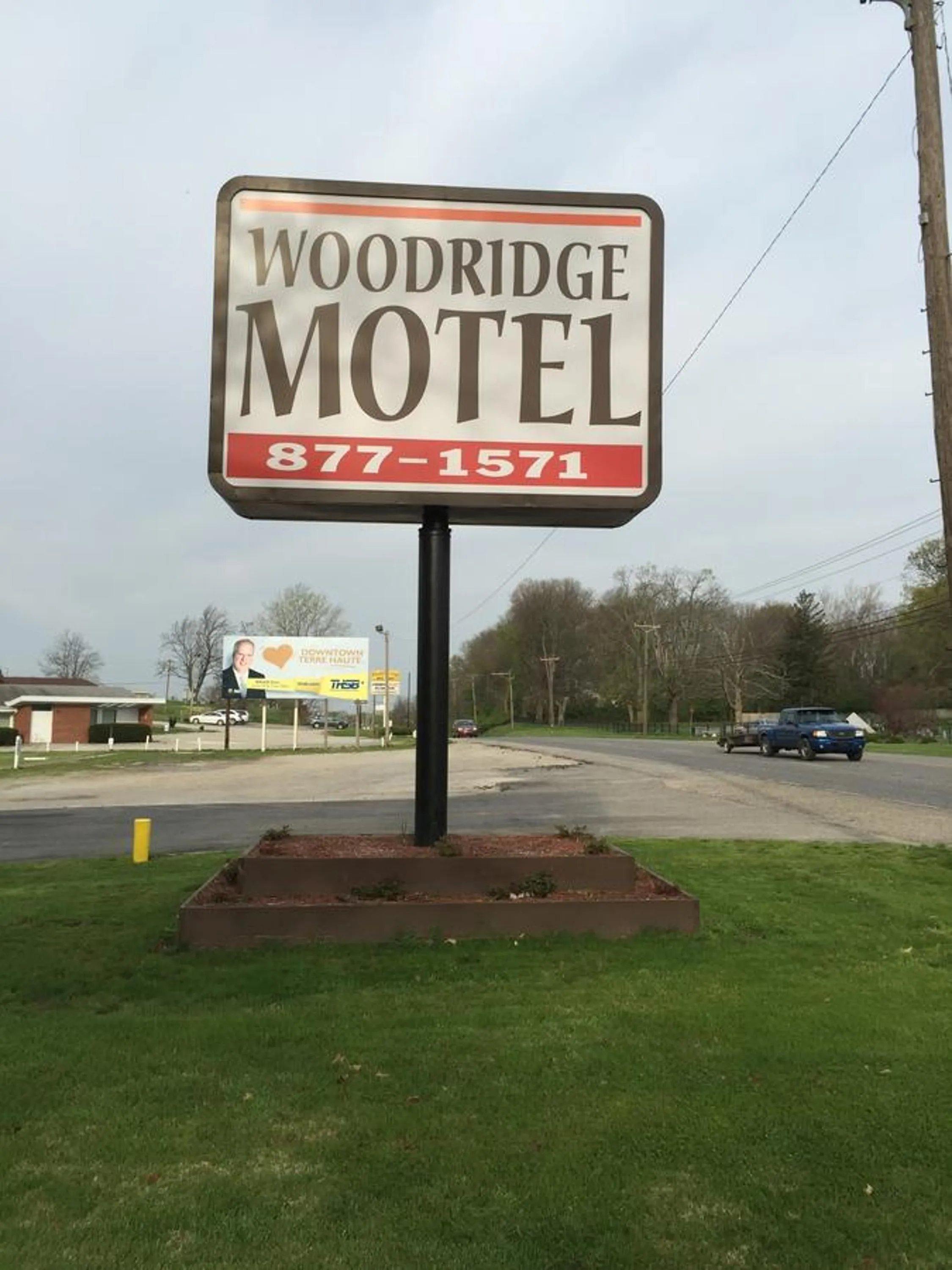 Property logo or sign in Woodridge Motel