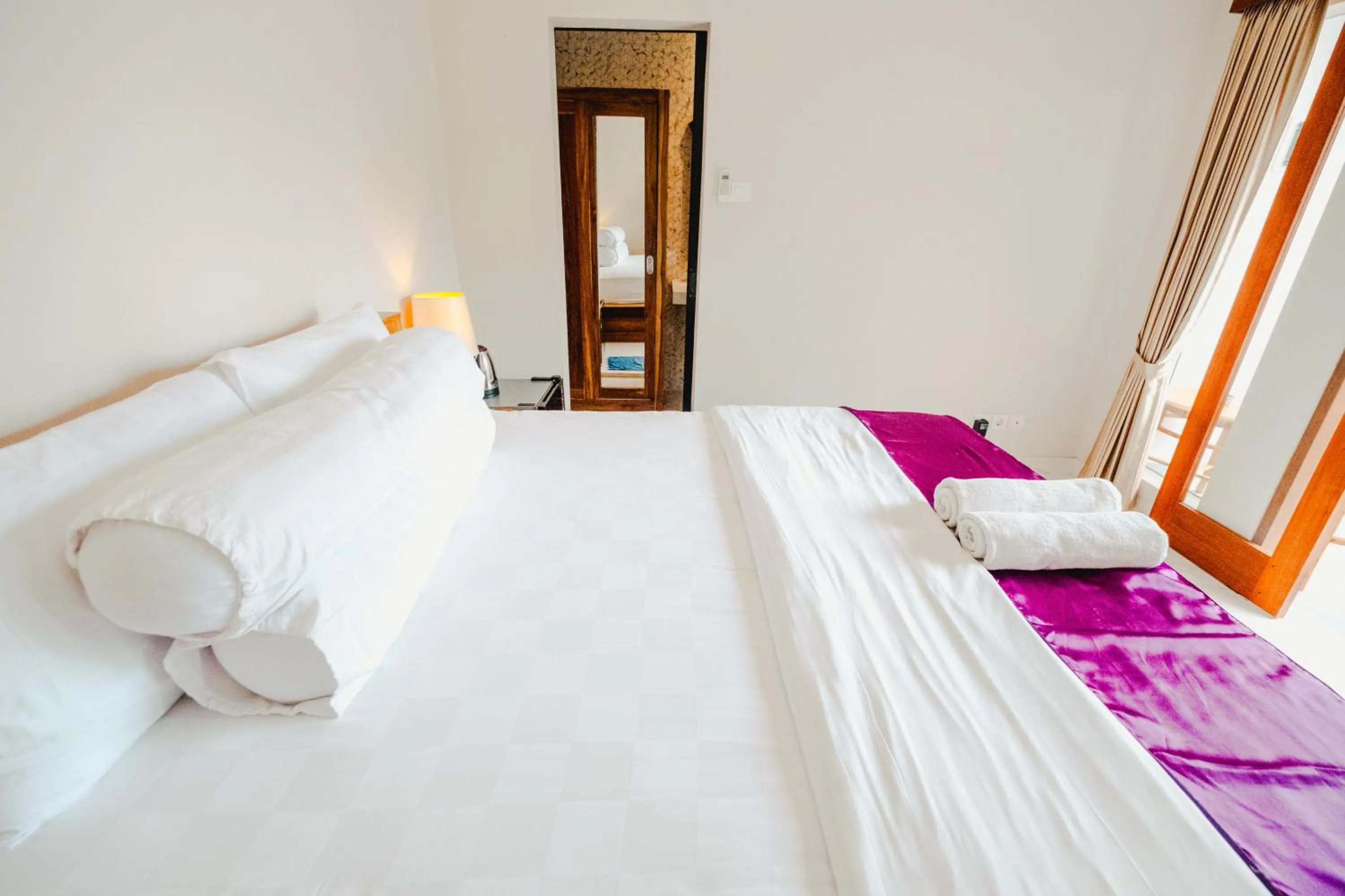 Bed in Turtle Shelter Guest House