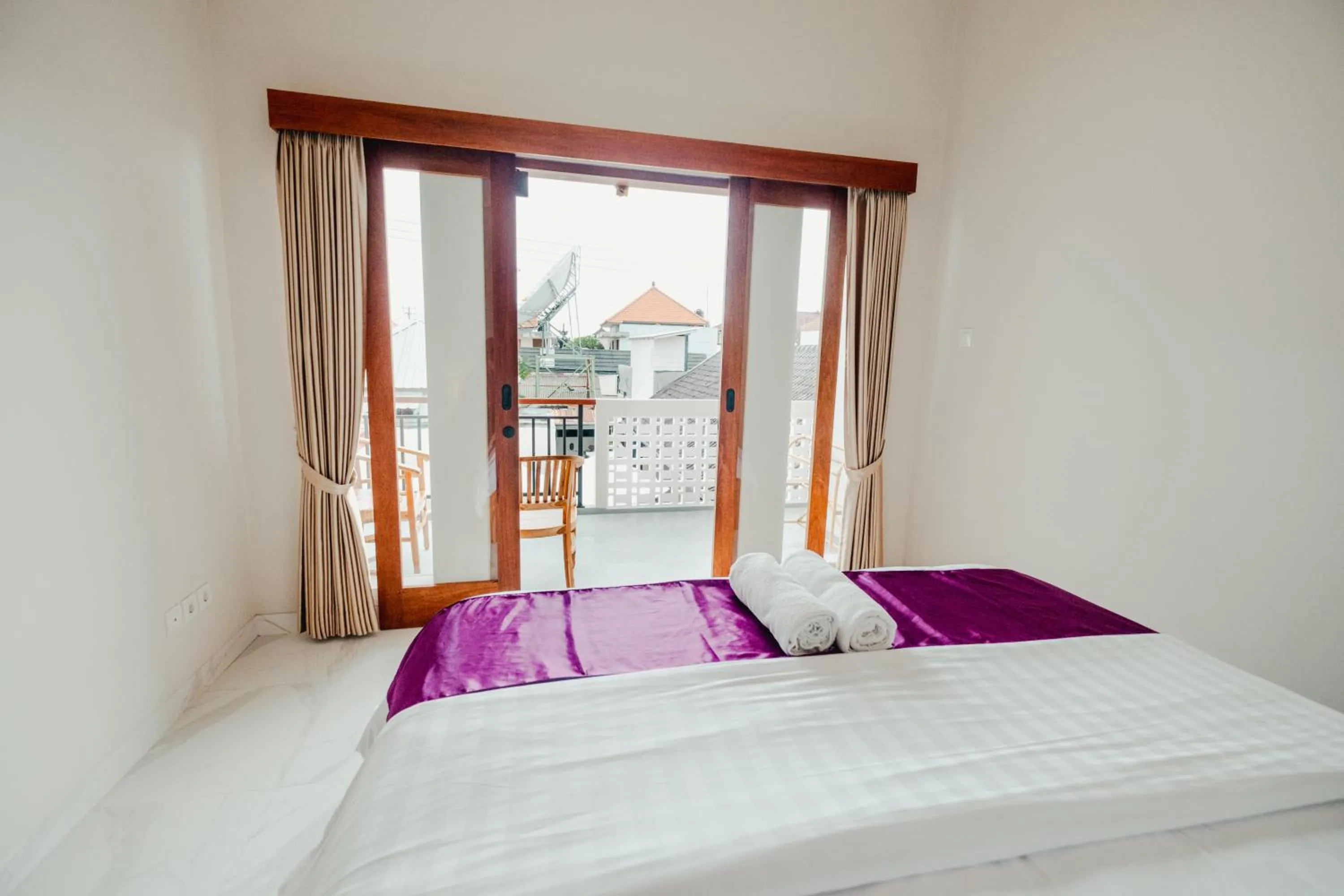 Bed in Turtle Shelter Guest House