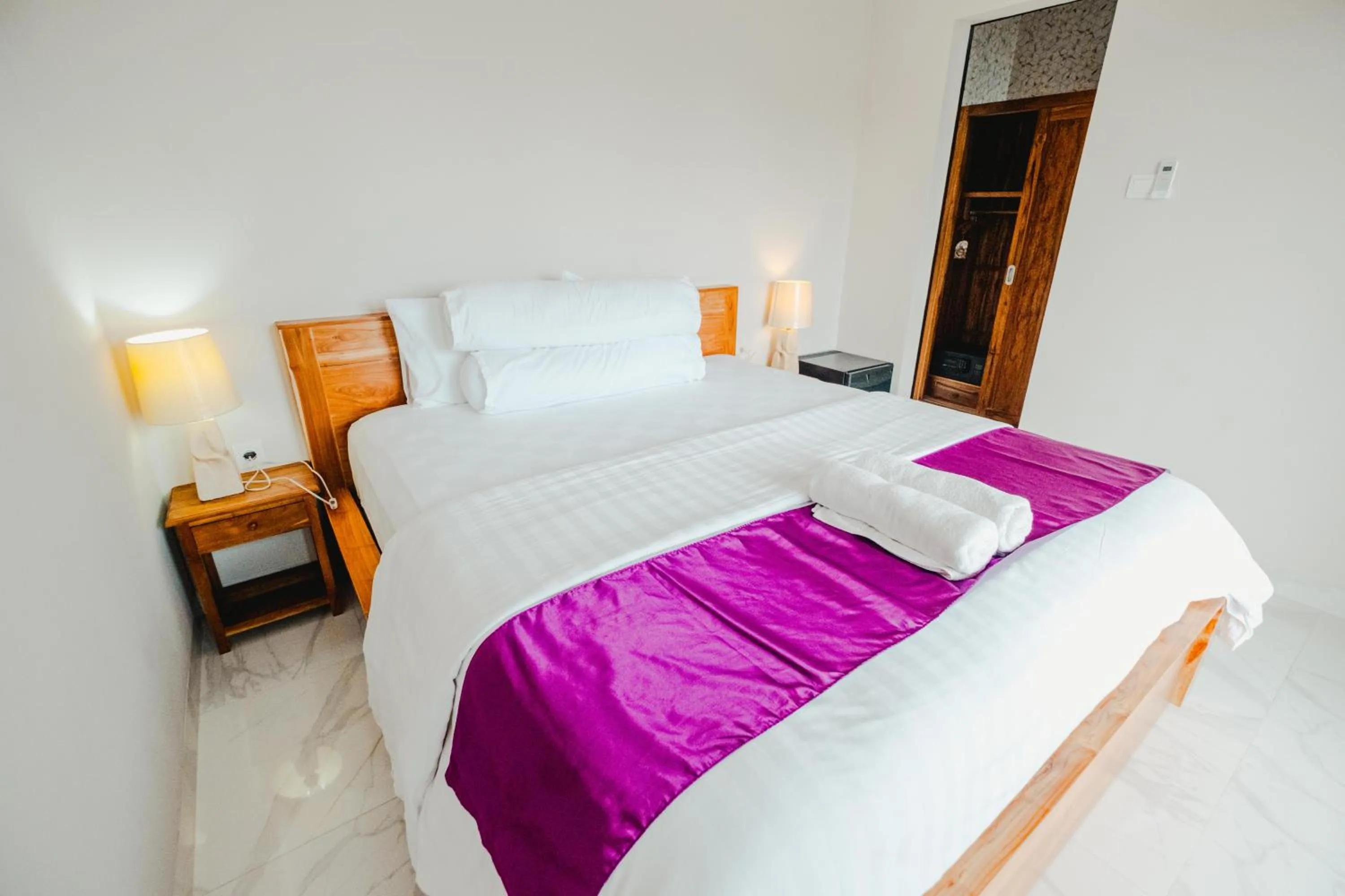 Bed in Turtle Shelter Guest House