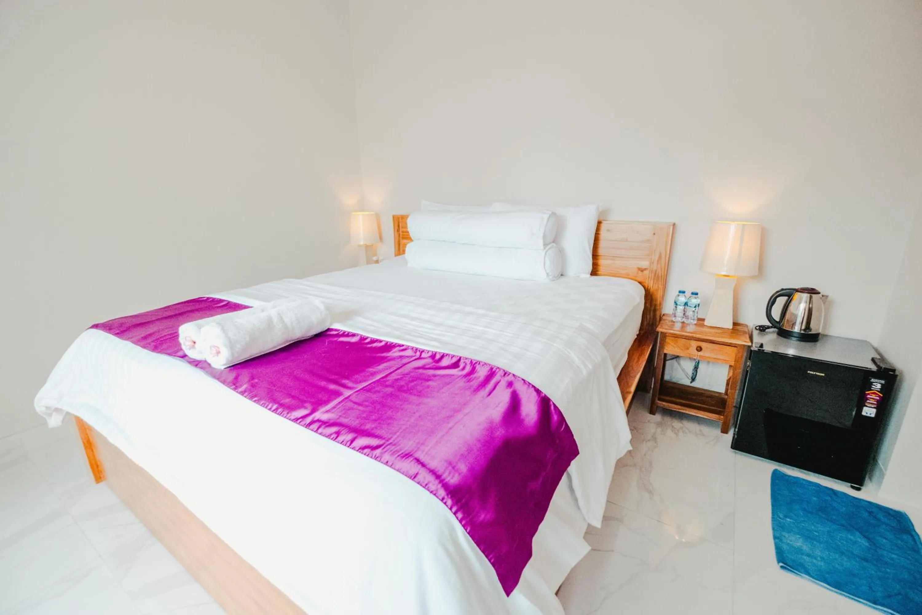 Bed in Turtle Shelter Guest House