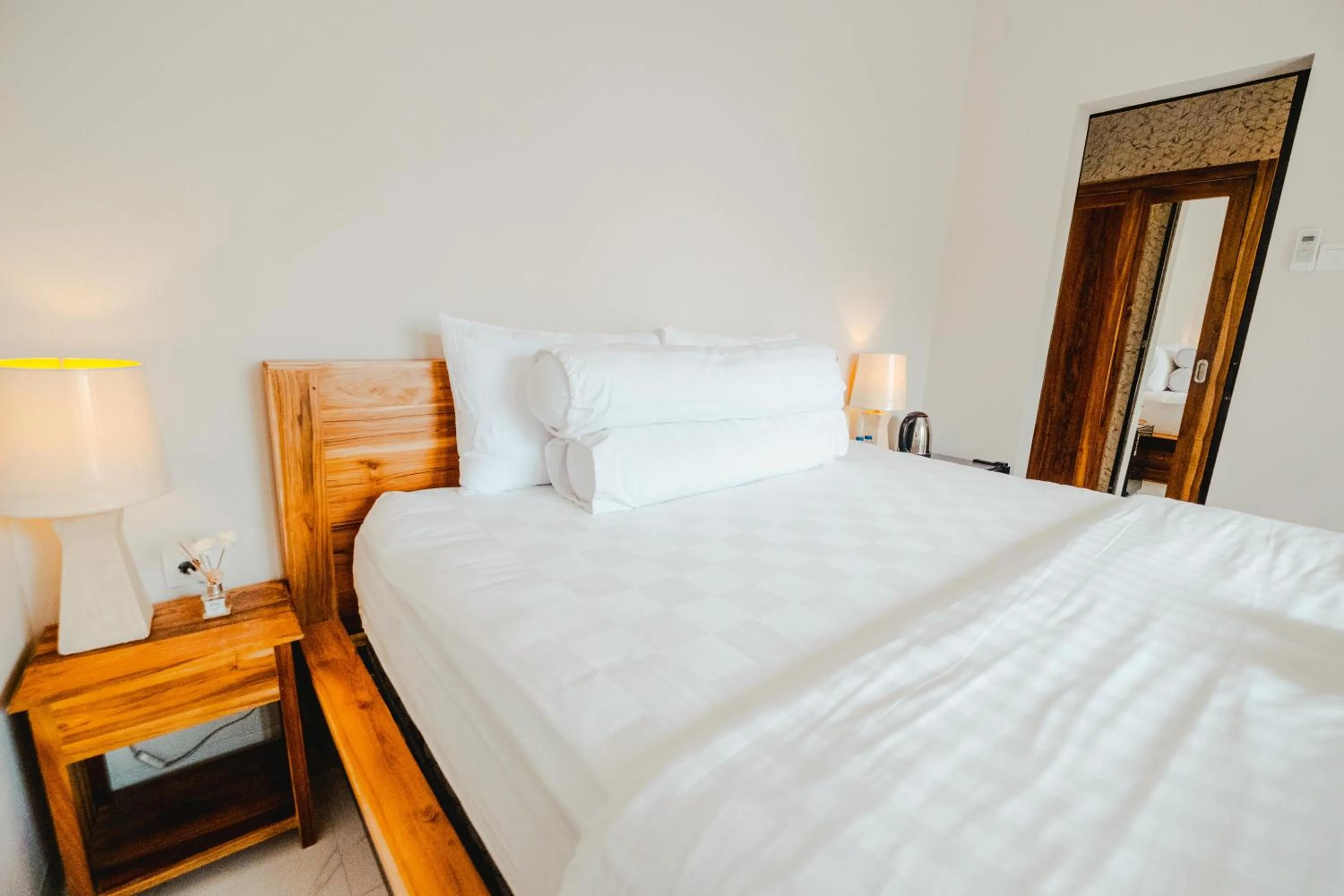 Bed in Turtle Shelter Guest House