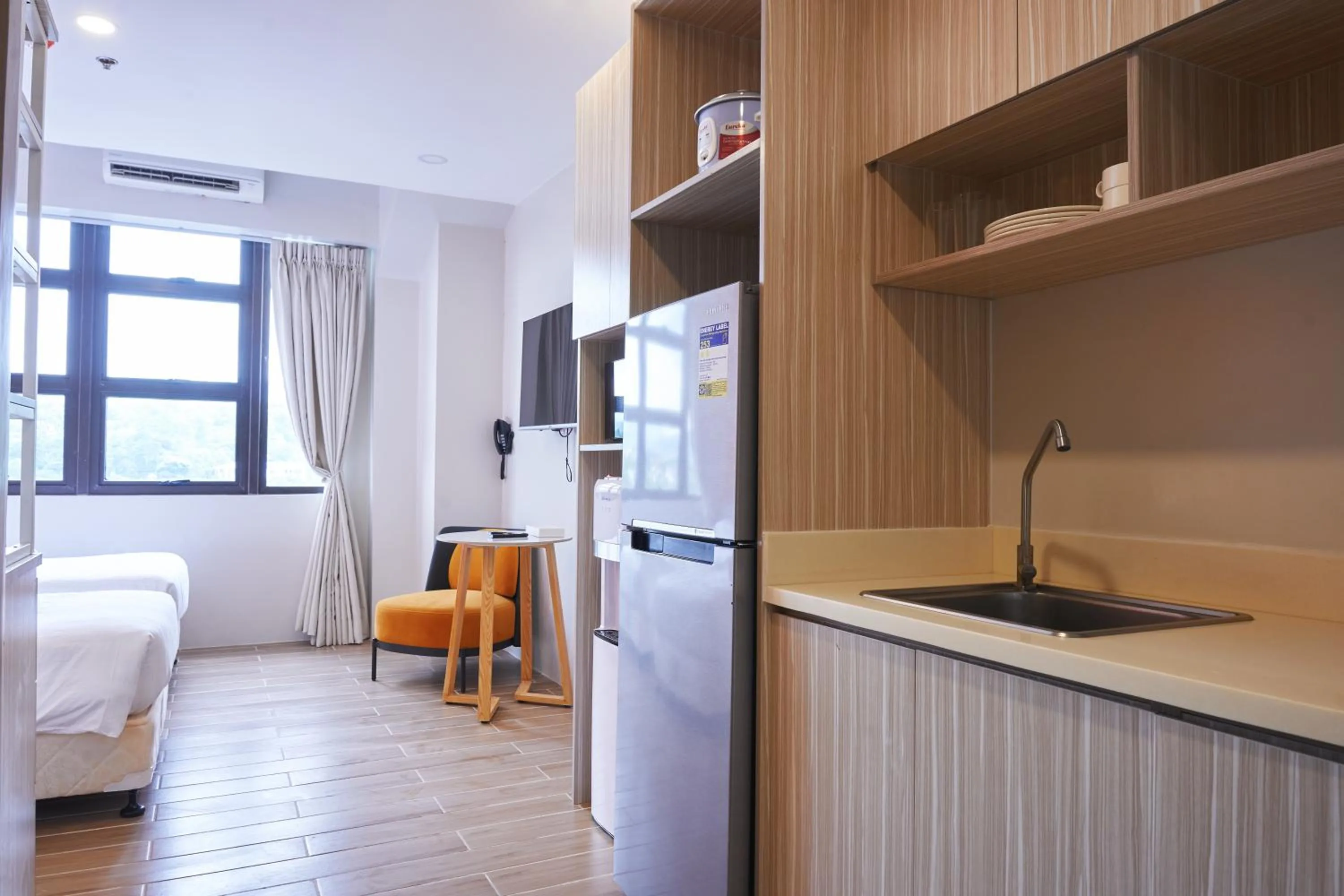 Kitchen or kitchenette, Bed in Treewoods Residences
