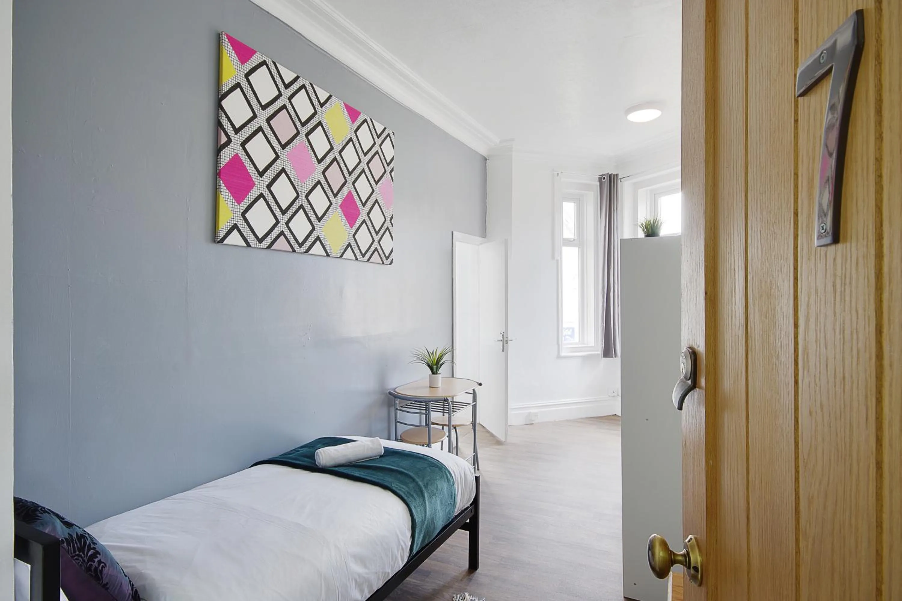 Bed in Azure Beach Hotel