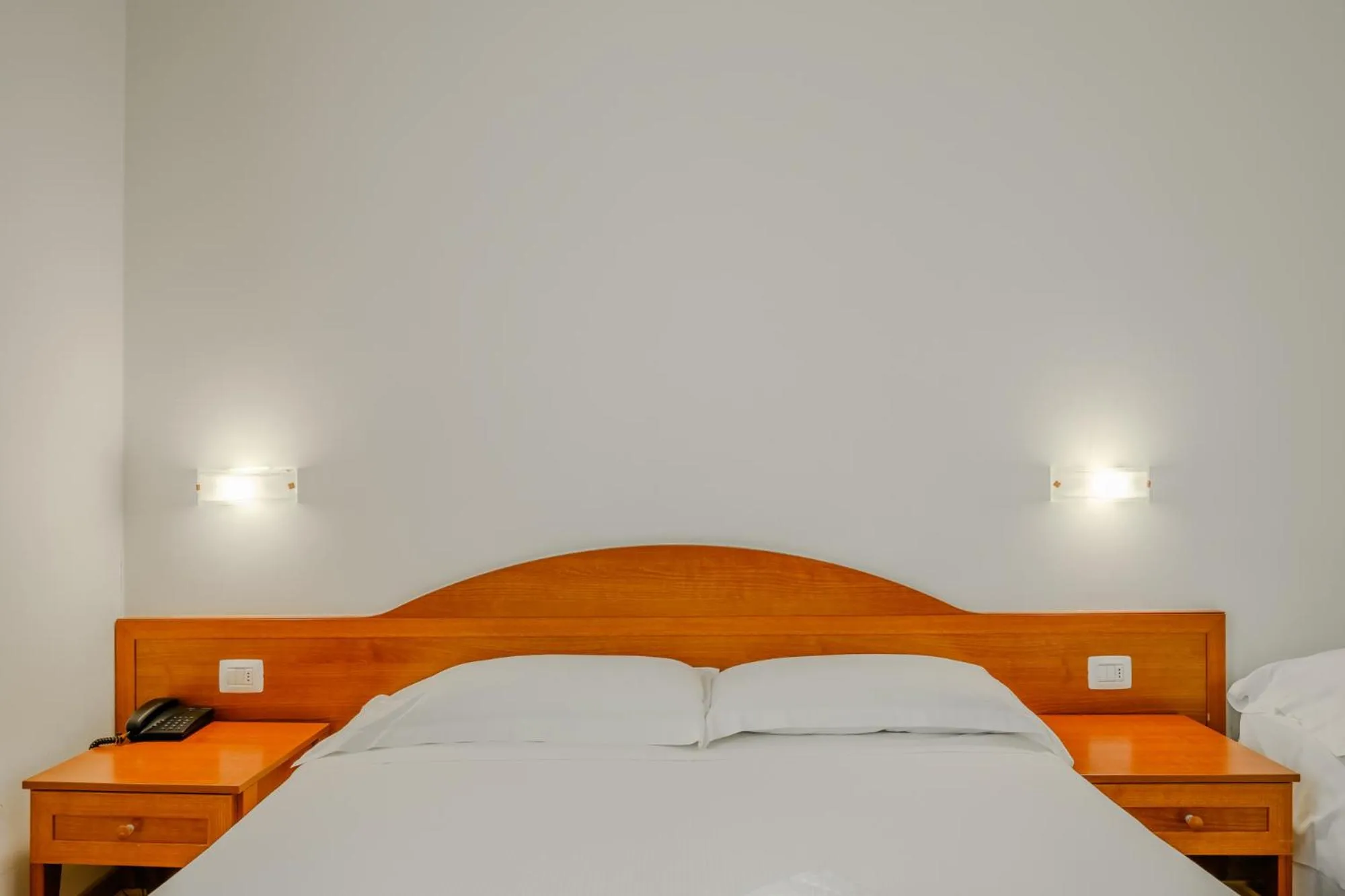 Bed in Hotel Nuova Barcaccia