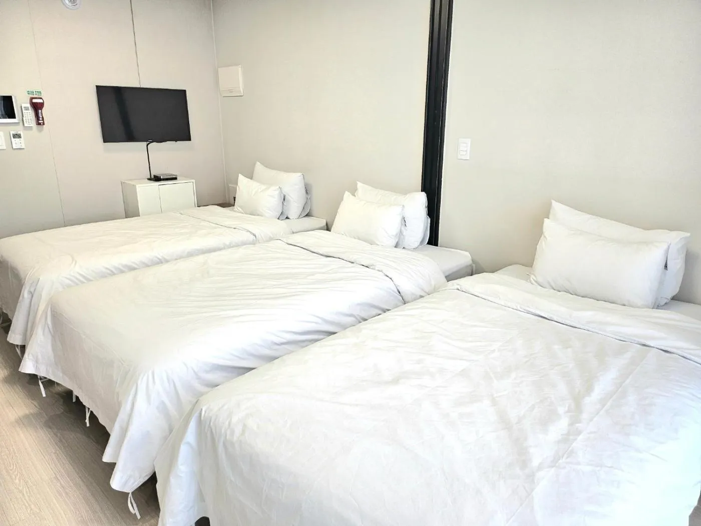 Bed in Grand Bleu Hotel & Residence