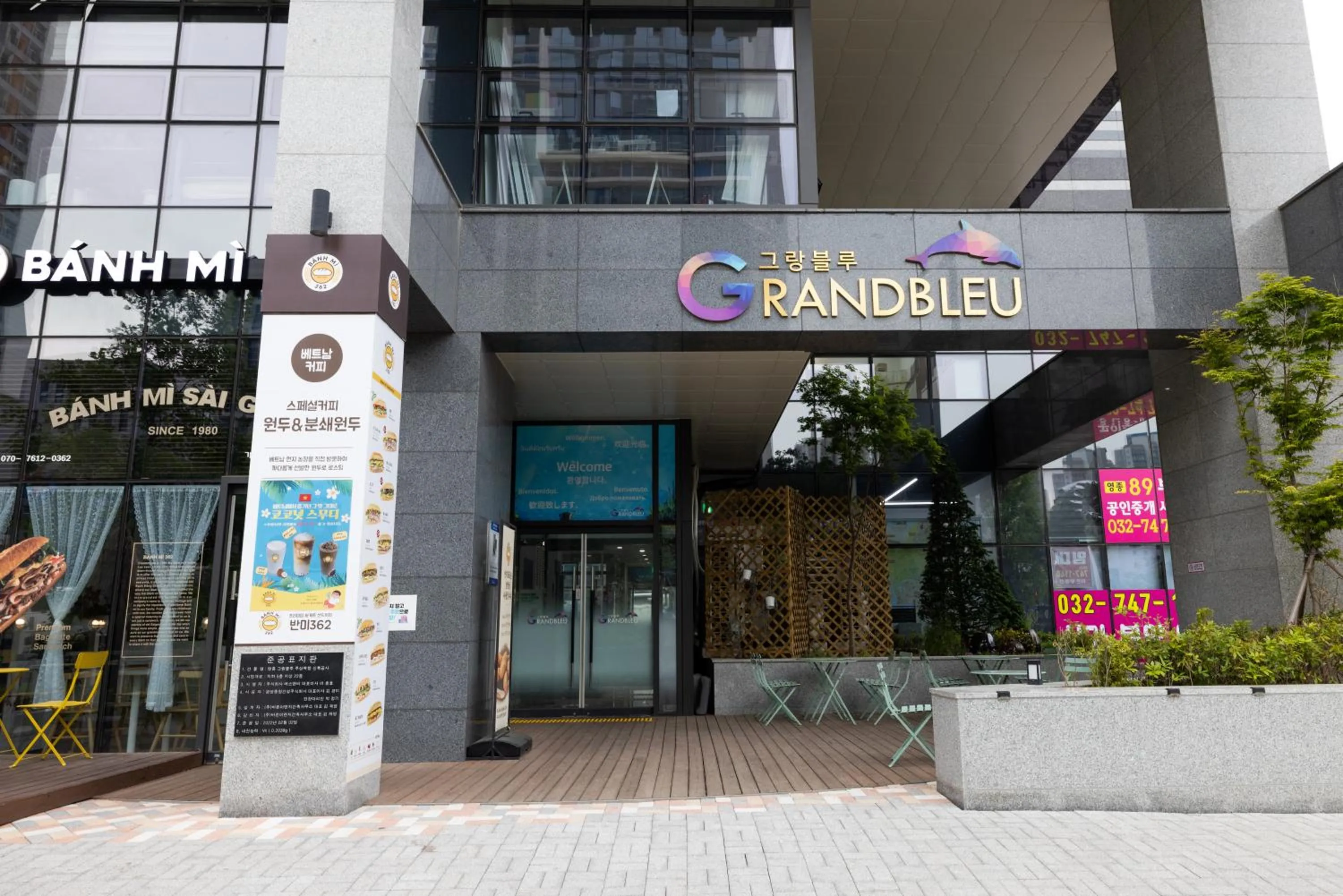 Property logo or sign in Grand Bleu Hotel & Residence