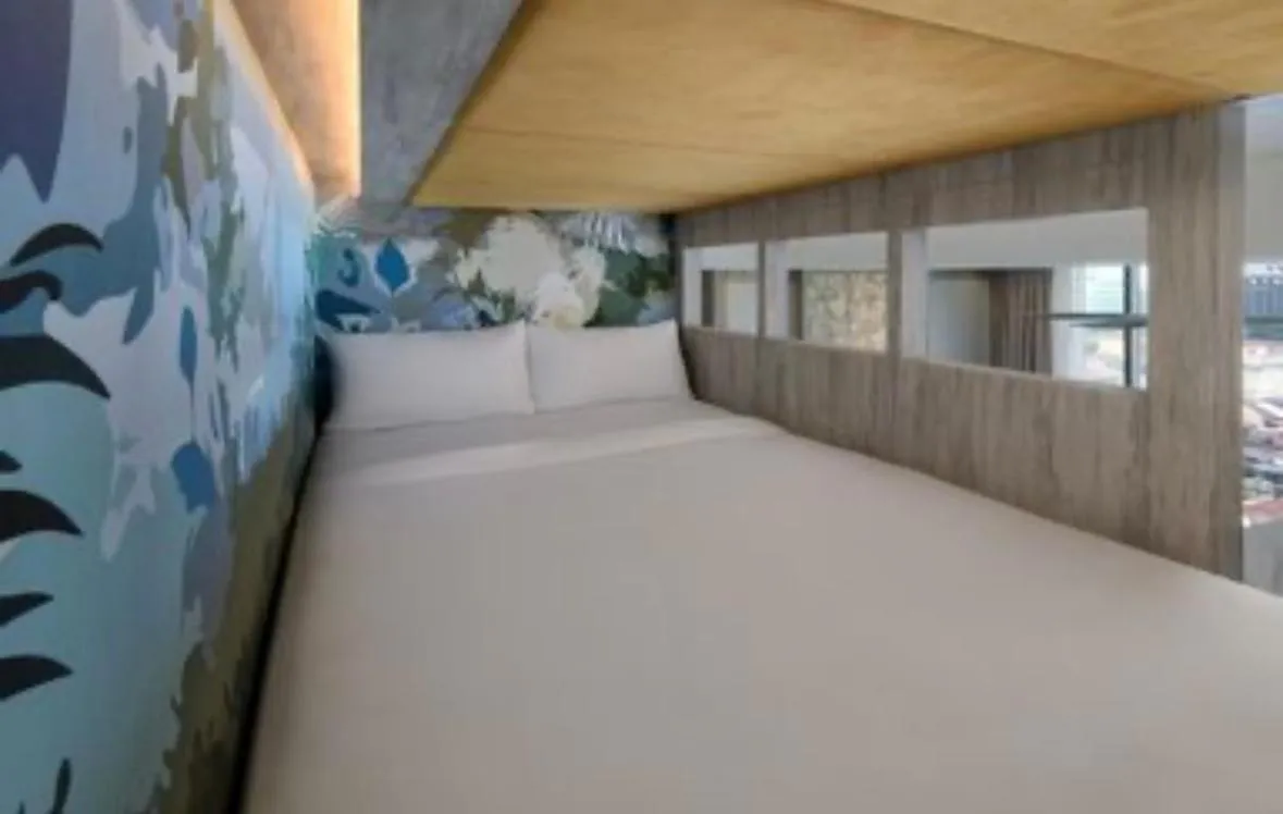 Bed in Fifth Avenue Hotel