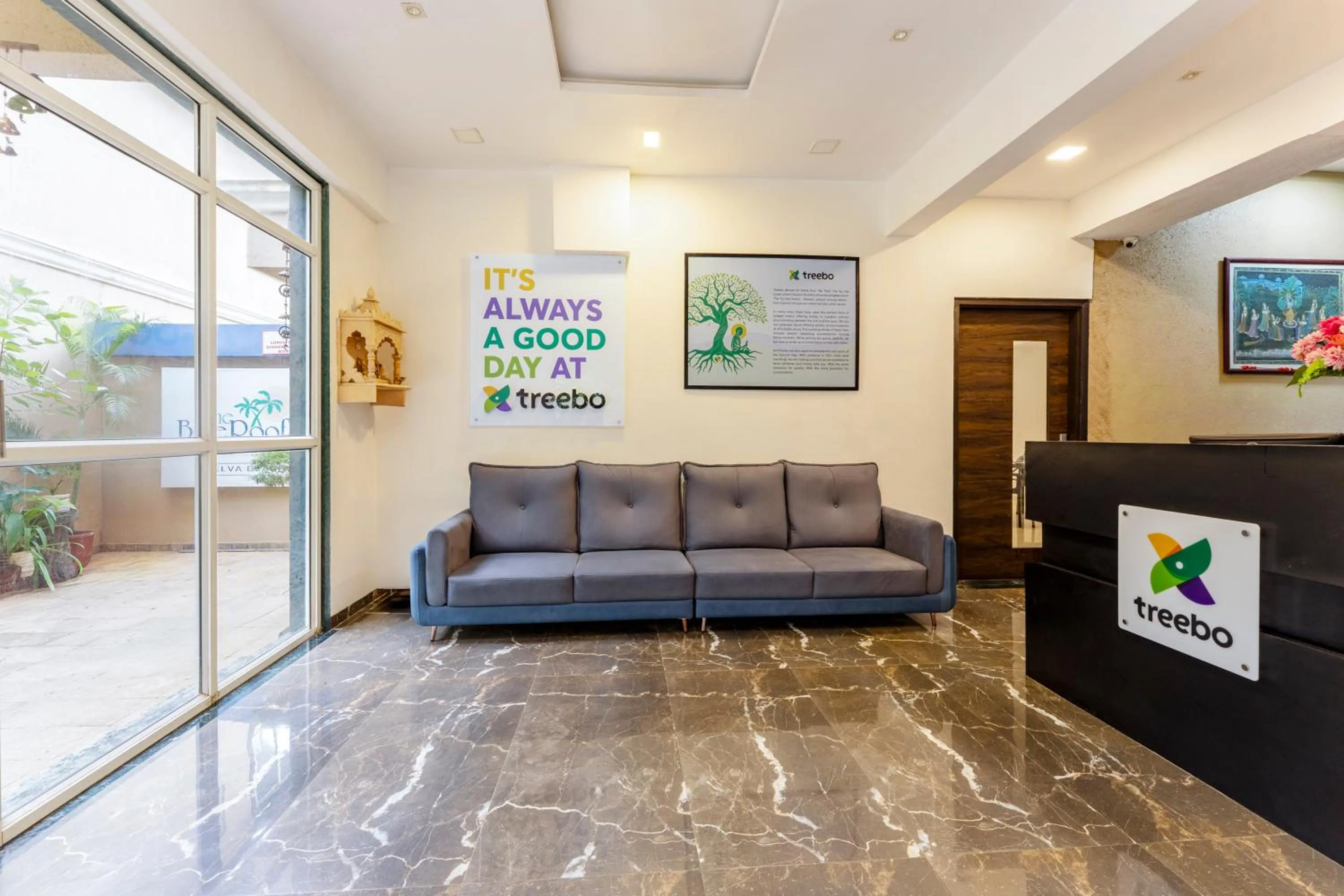 Seating area in Treebo Blue Roof, Kelwa